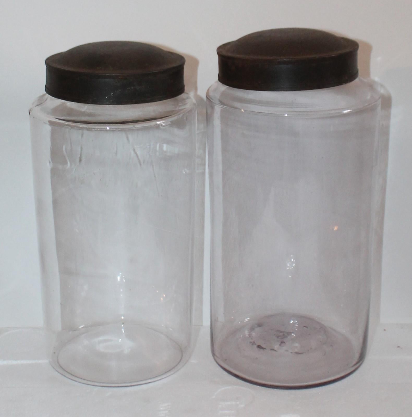 Folk Art 19th Century Hand Blown Canister Jars with Tin Lids Jars, Collection of Three For Sale
