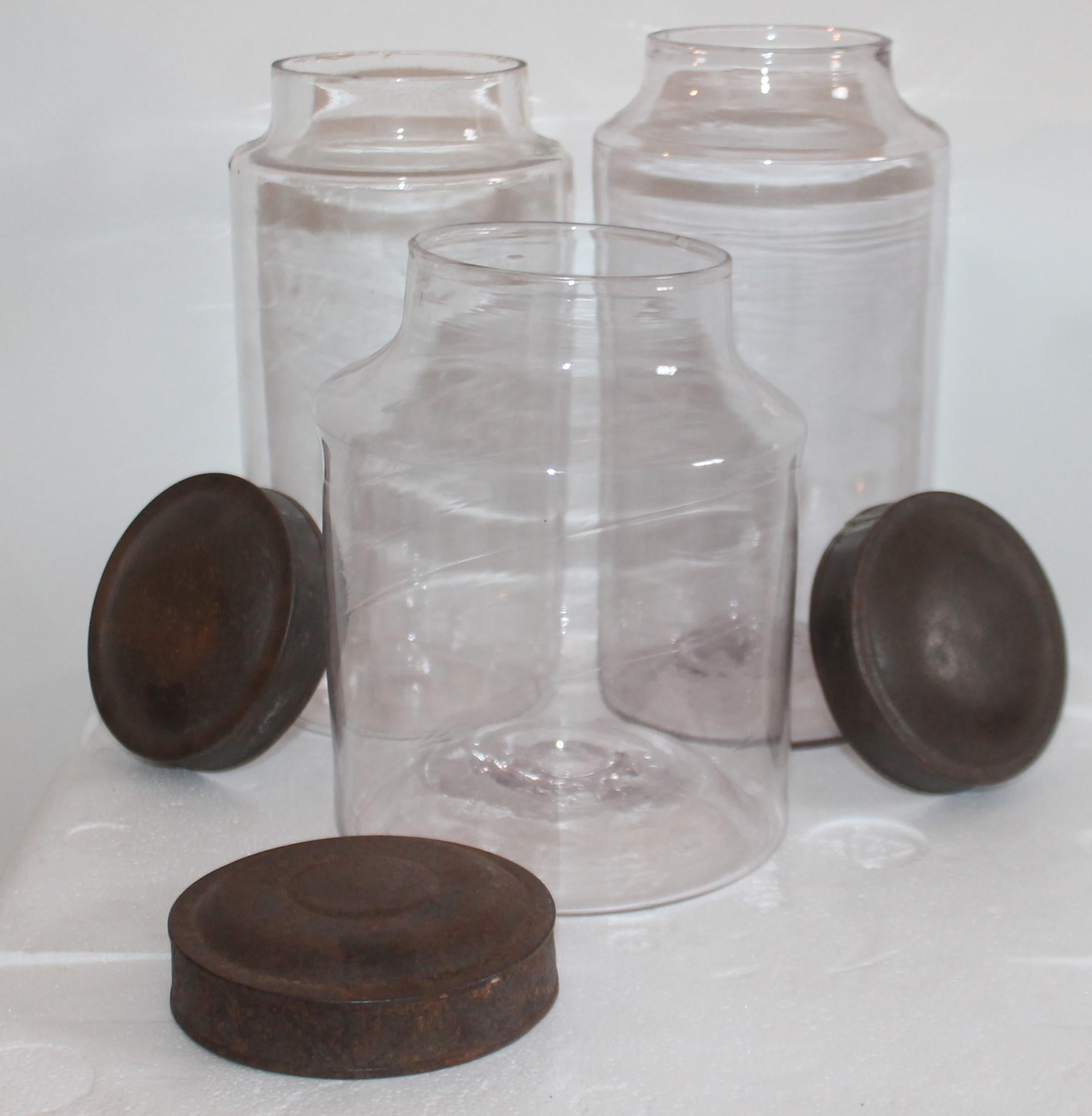 American 19th Century Hand Blown Canister Jars with Tin Lids Jars, Collection of Three For Sale