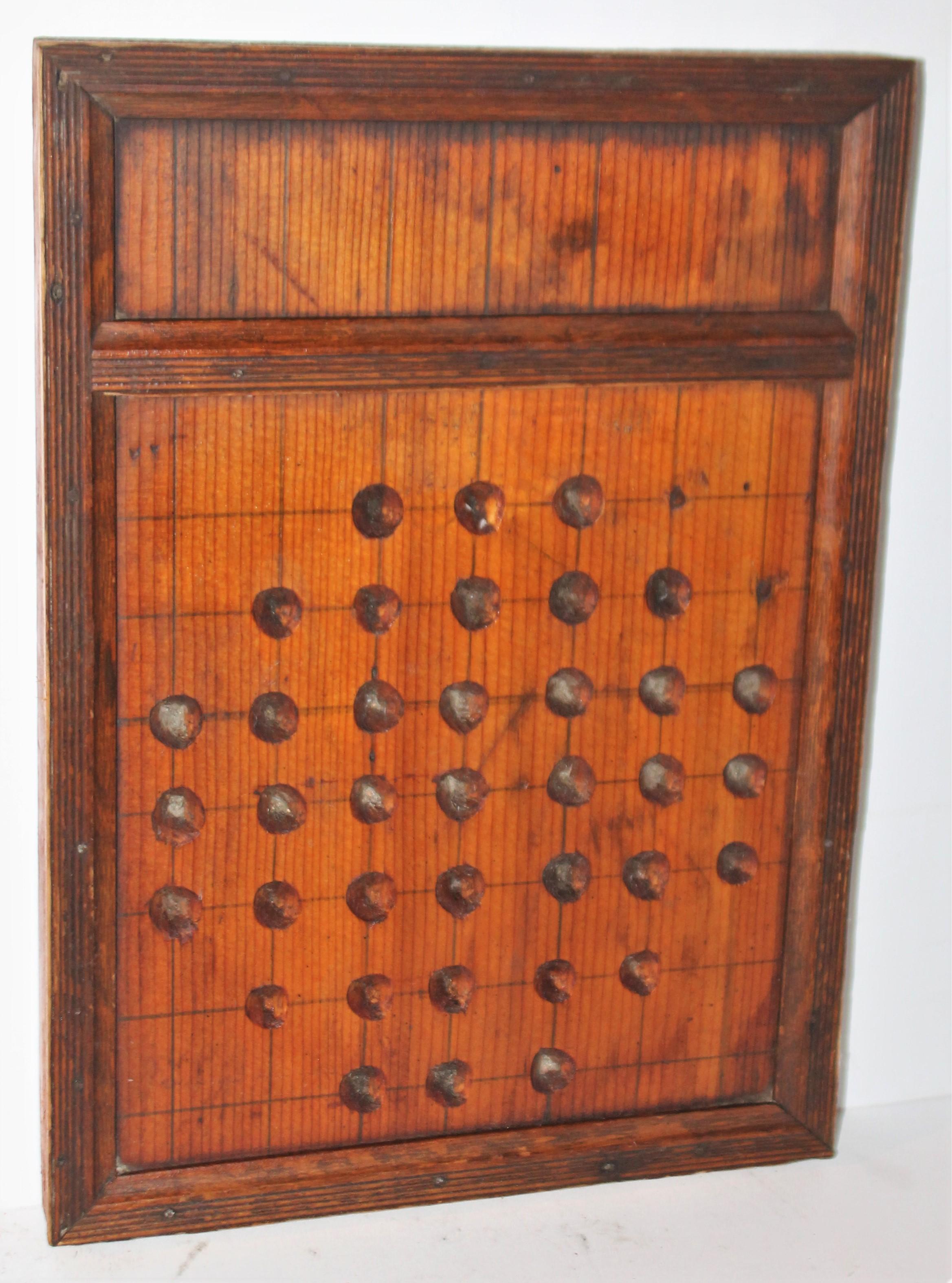 19th century handmade pine marble game board in good condition with a nice mellow patina.