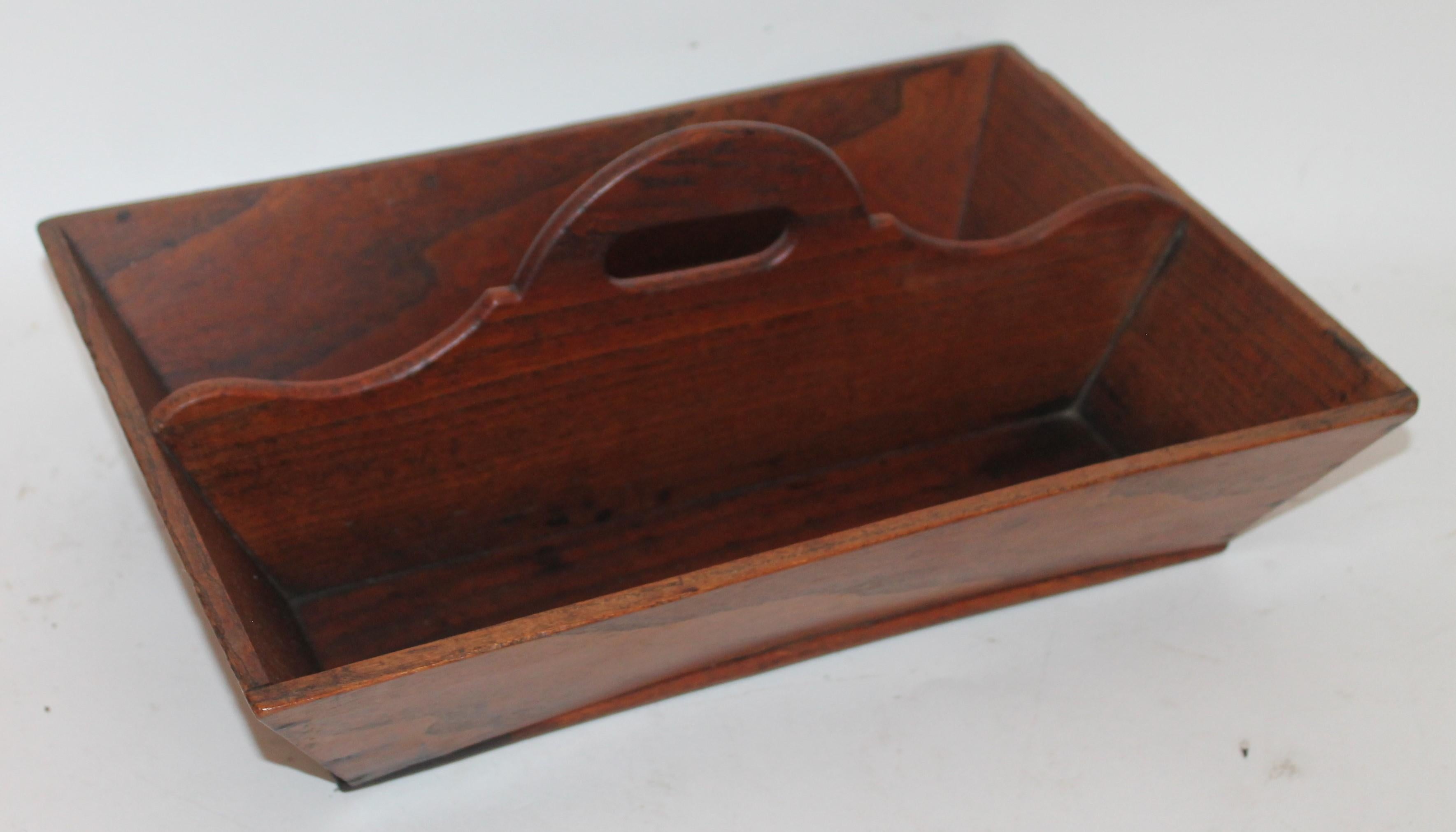 This fine detailed handcrafted walnut wood with fine detail cutout is in great as found condition. This carrier has fine cut nails and in great condition.