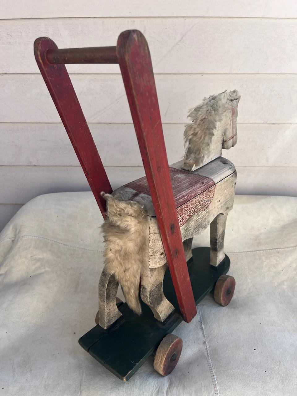 19thc original painted & hand crafted pull toy horse on wheels for that country home or toy collector. Fantastic original surface paint.
