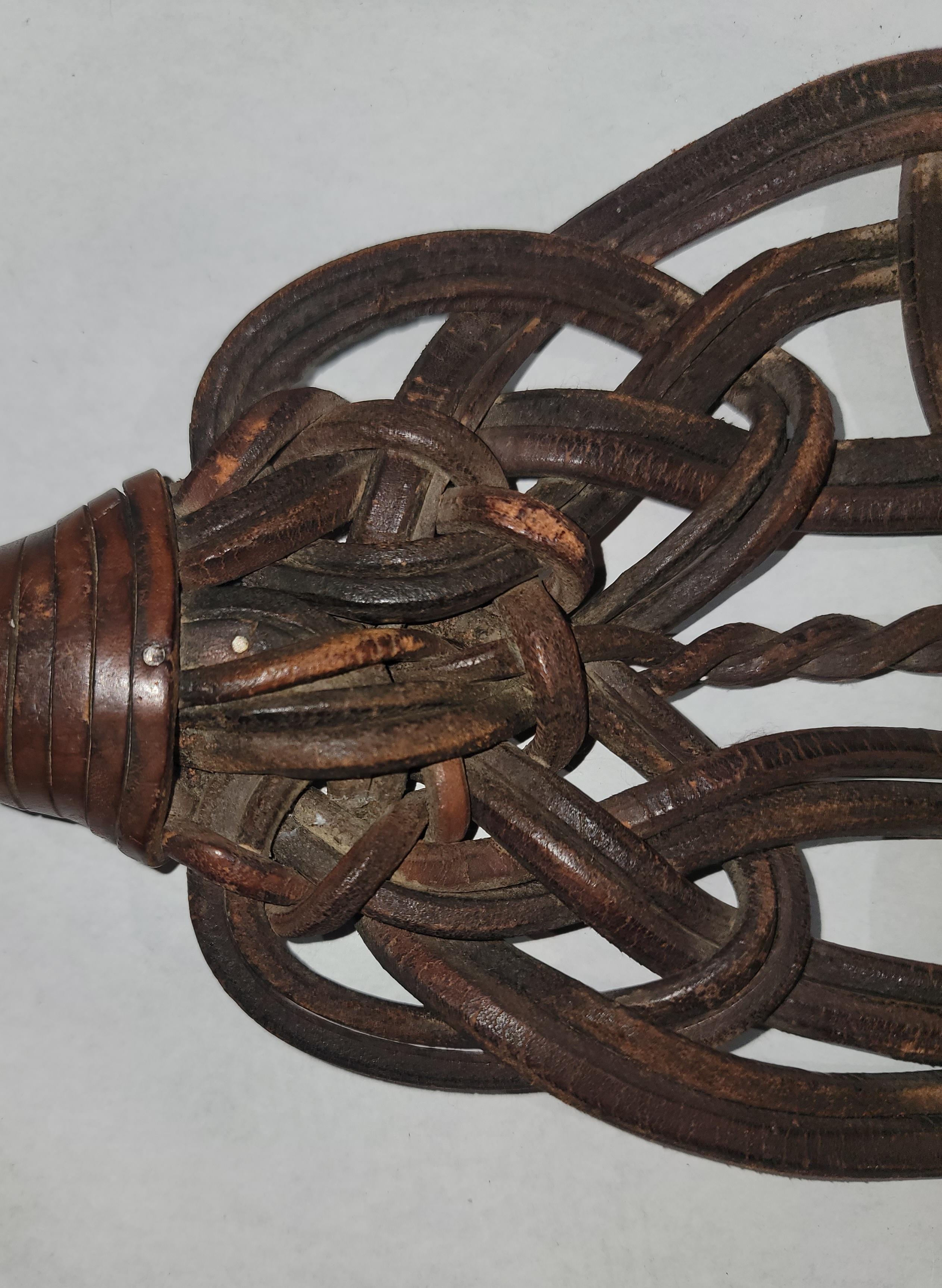 antique rug beater