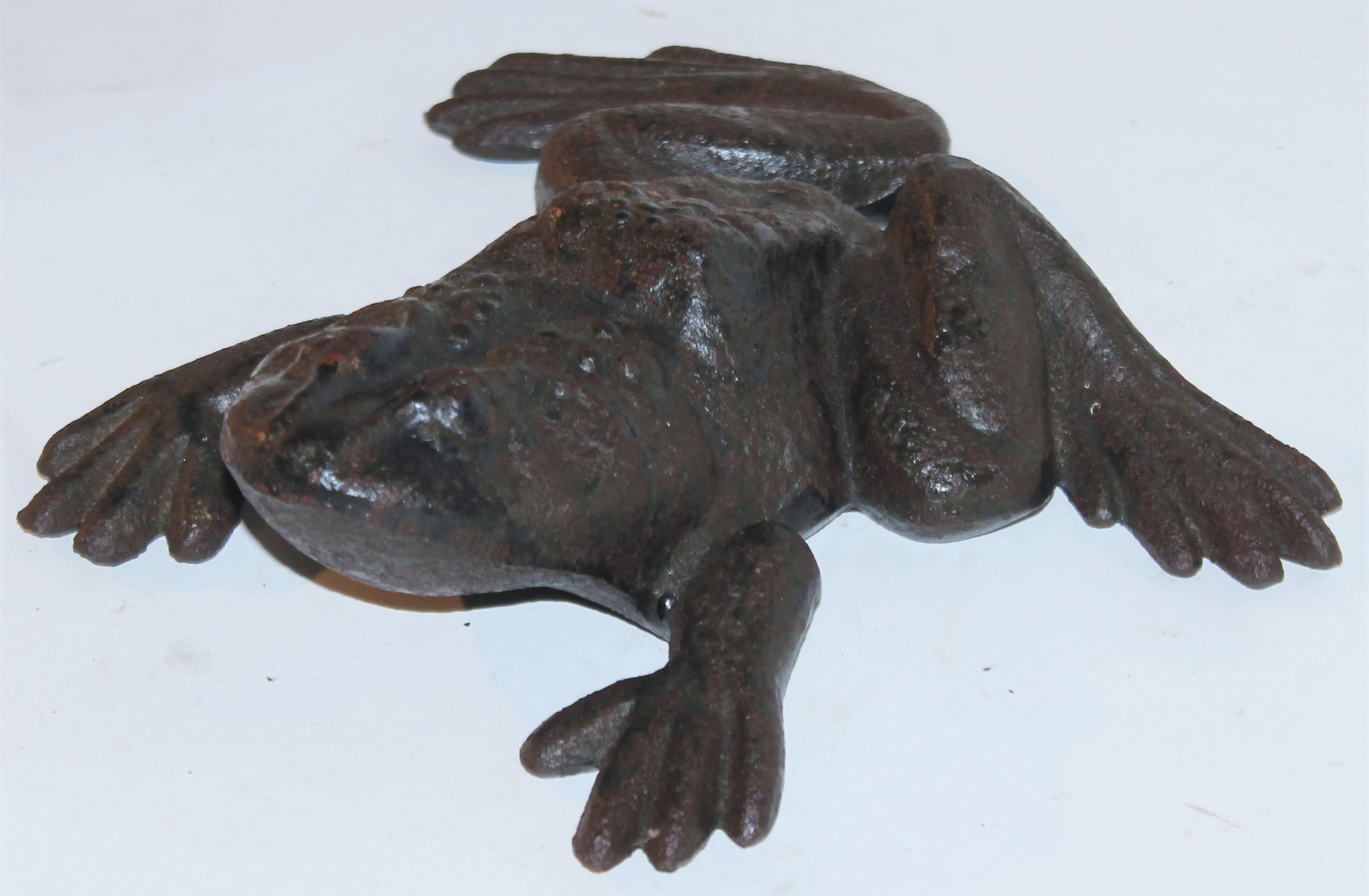 This folky cast iron frog is in great condition and has original old painted & worn surface. It is heavy like a door stop.