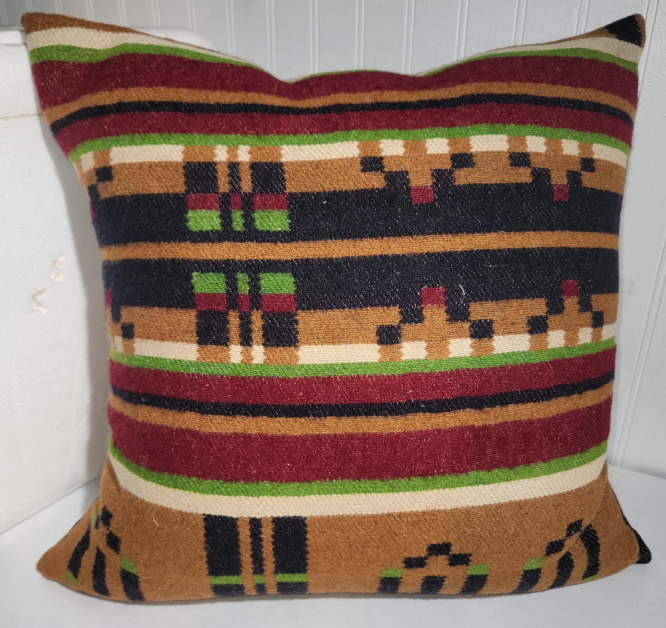 These amazing striped 19thc horse blanket pillows are in wool with cotton linen backings.Sold as a group of three.The inserts are down & feather fill.