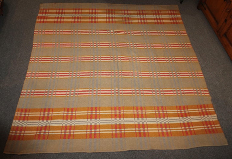 These fine bitter sweet colors are simple and rich in this wool horse blanket. The condition is very good.