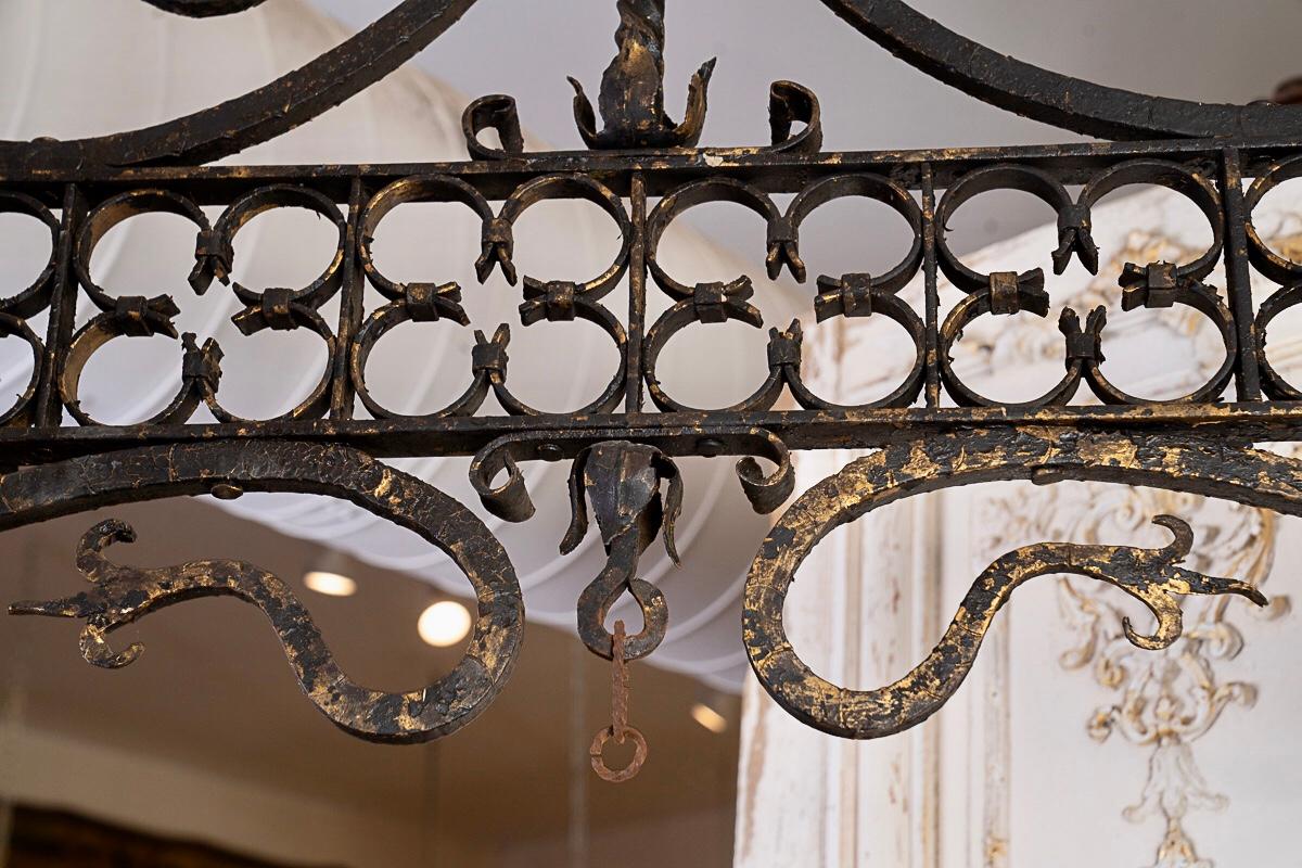 19thc Oblong iron chandelier-perfect over a kitchen island. The height is adjustable and it has the original chain.