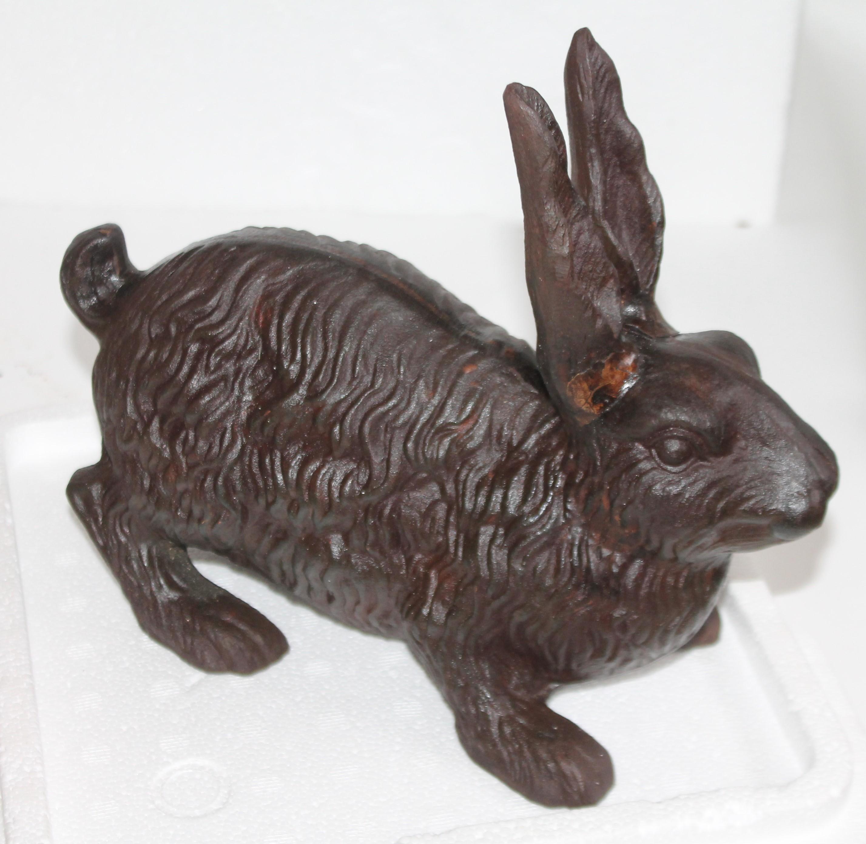 This 19th century aged surface cast iron hollow body rabbit door stop or garden ornament is in very good condition. This is a heavy guy and could serve many purposes.