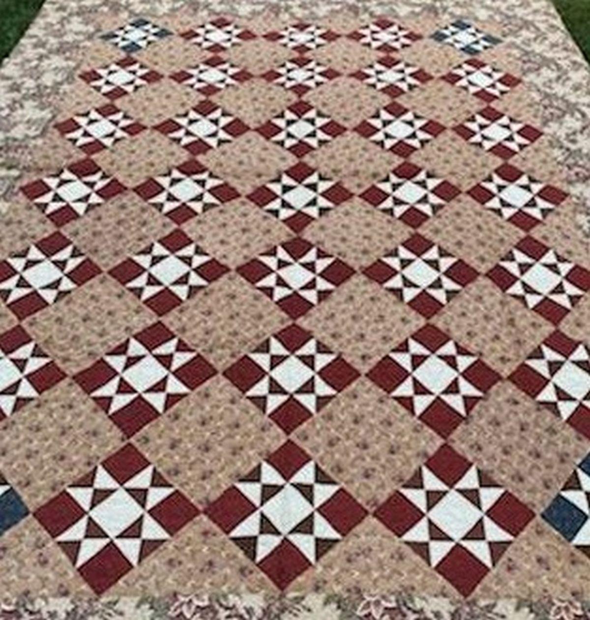 This fine eight point star quilt in early 1800s calico fabric has a beautiful rare chintz border. The border and the quilt are in pristine condition. This is a fine museum quality quilt. This quilt was from a private collection in Lancaster County,