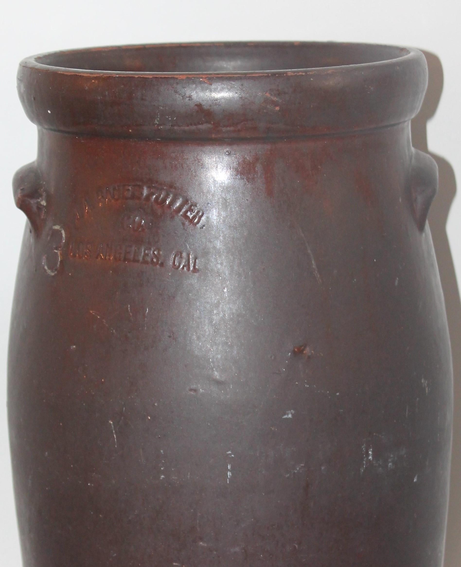 antique brown crock butter churn