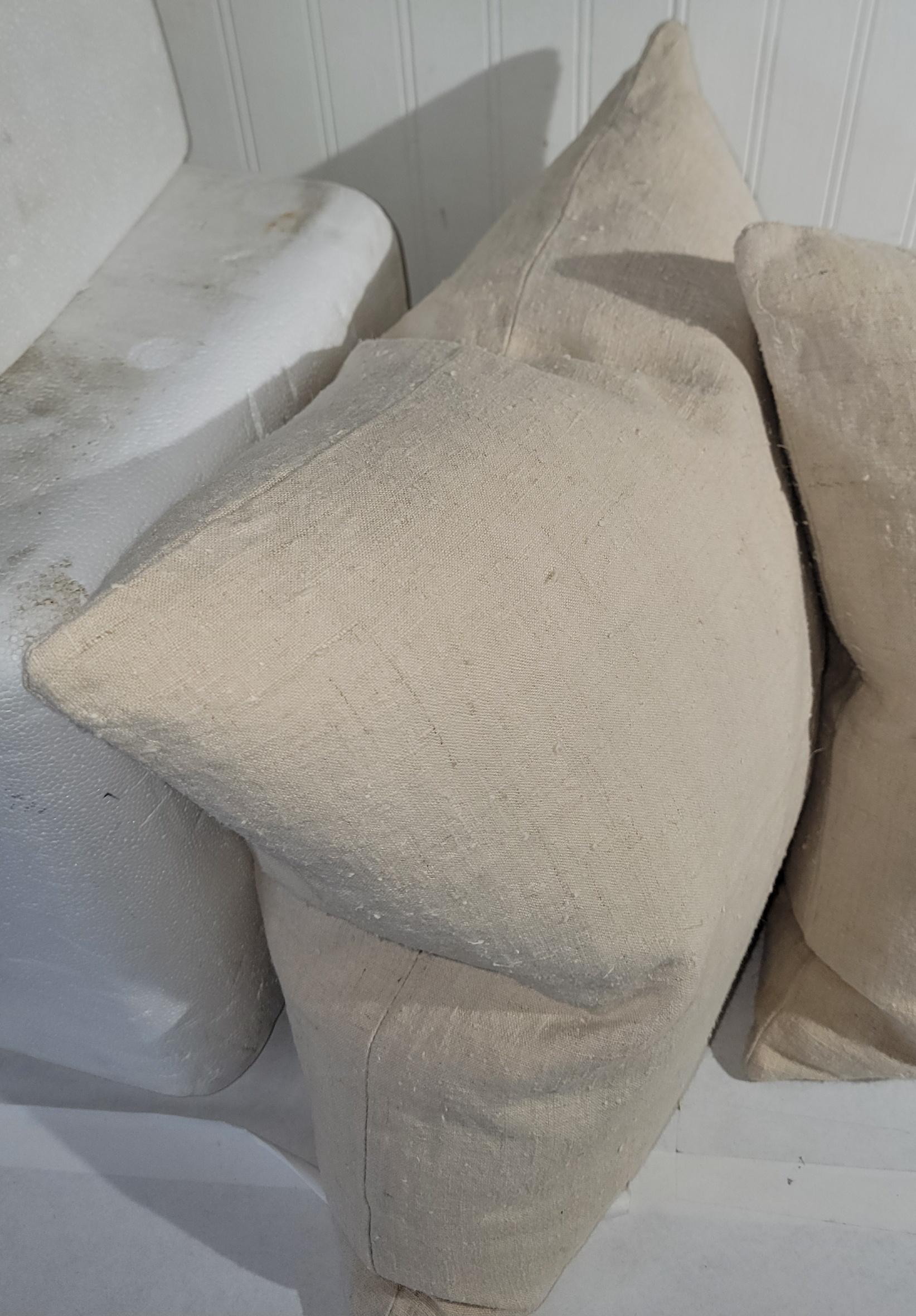 These 19thc homespun linen pillows are in fine condition with no stains or damages.The inserts are down & feather fill.Sold as a pair.