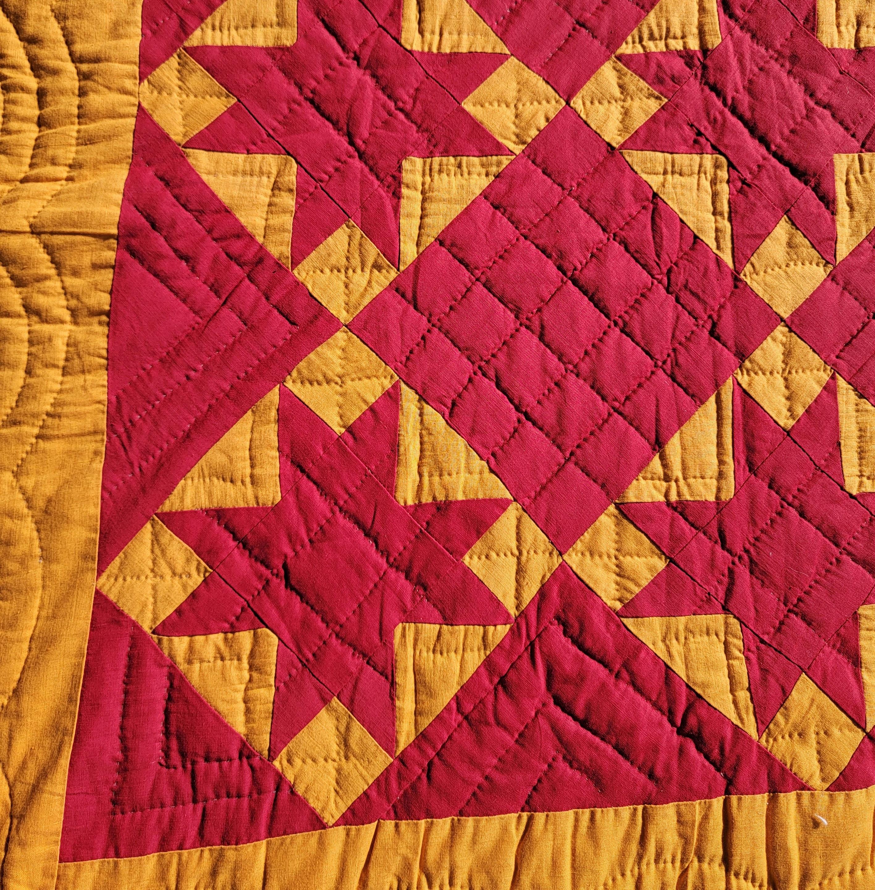 19thc red stars on a cheddar orange ground. This Mennonite quilt is in fine as found condition. It was found in Berks County, Pennsylvania.