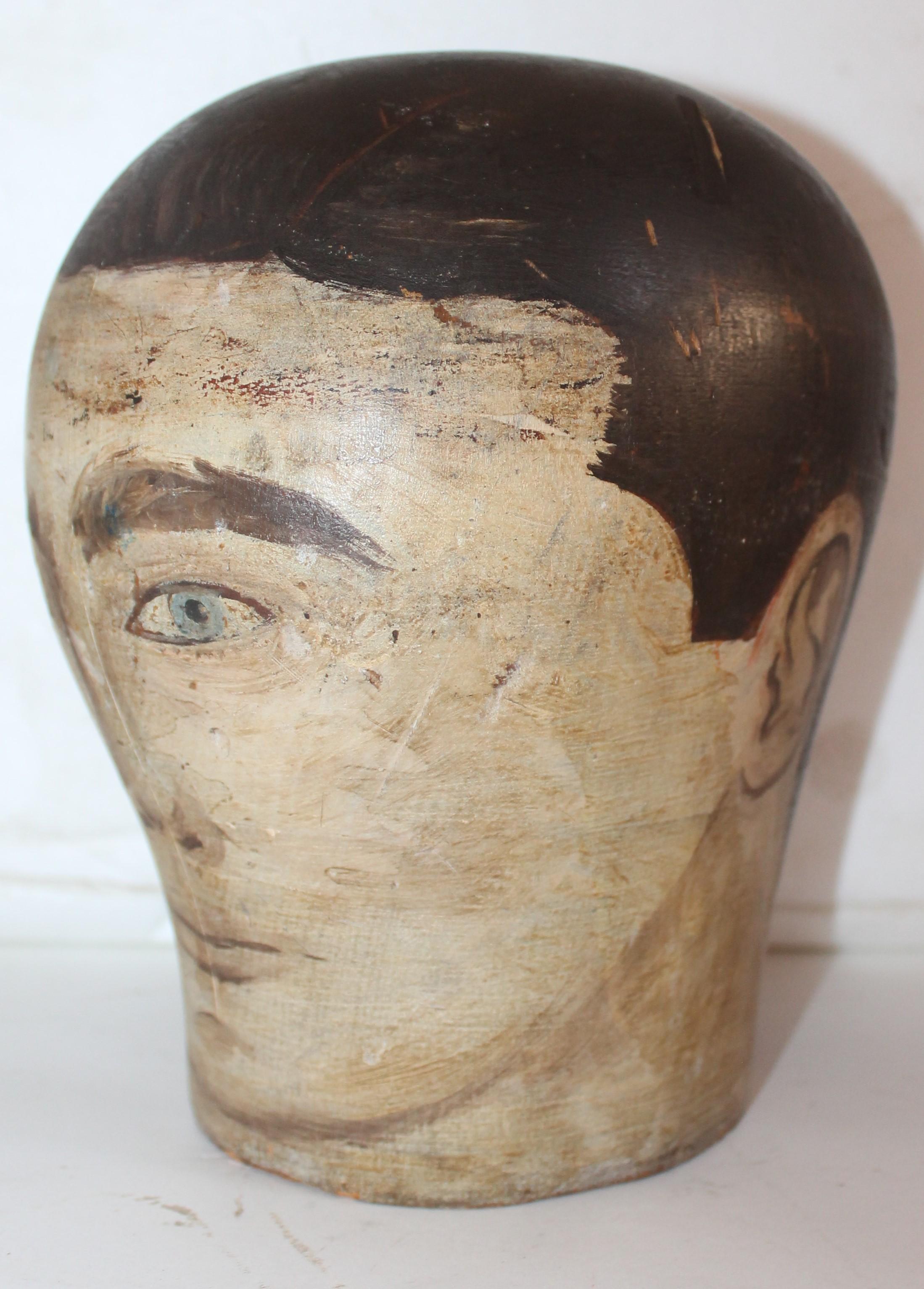 19th century Milliners painted wood head. Original condition and original paint.