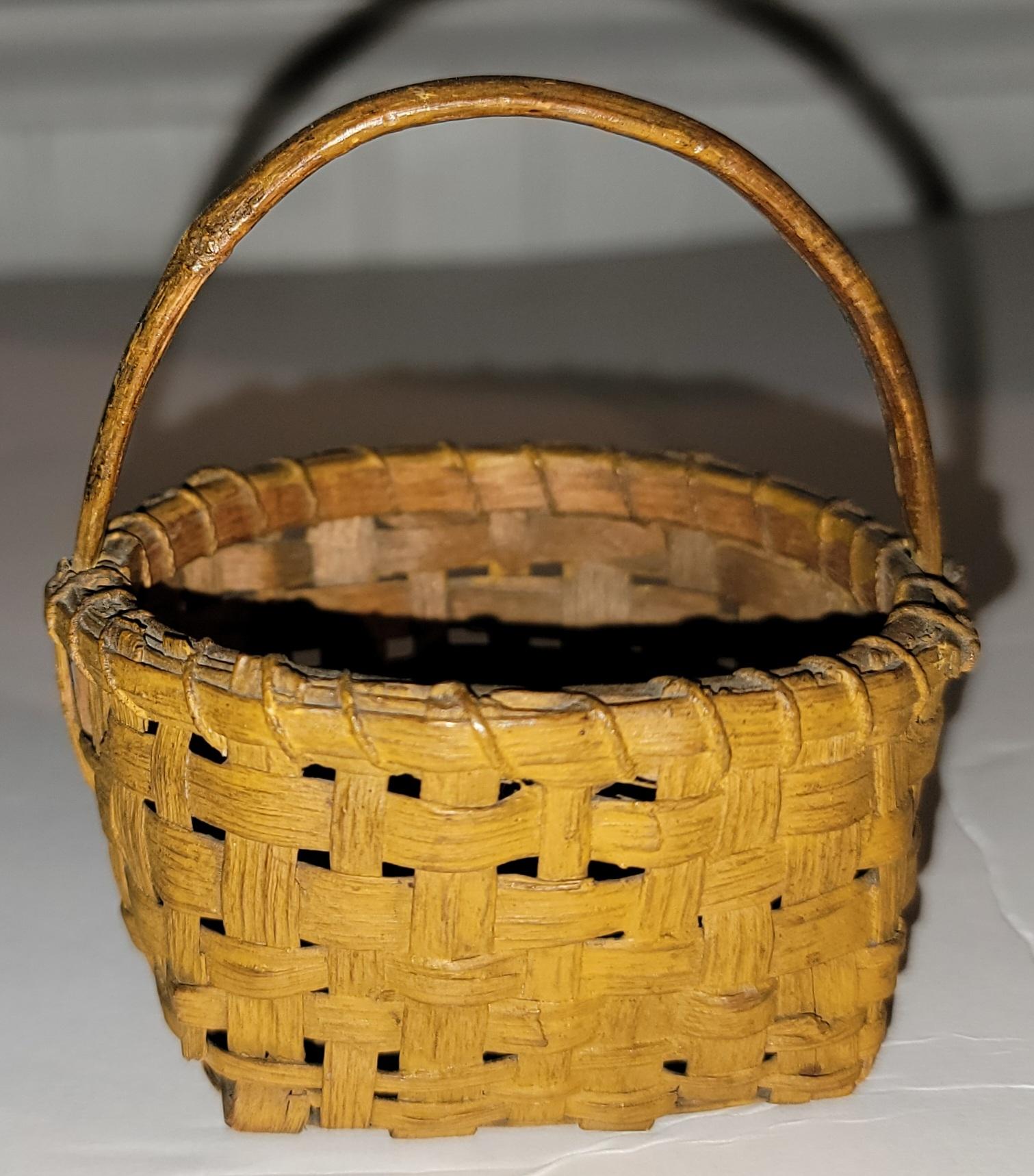 19thc Miniature original painted basket from New England in very good condition.Amazing mustard paint and condition.