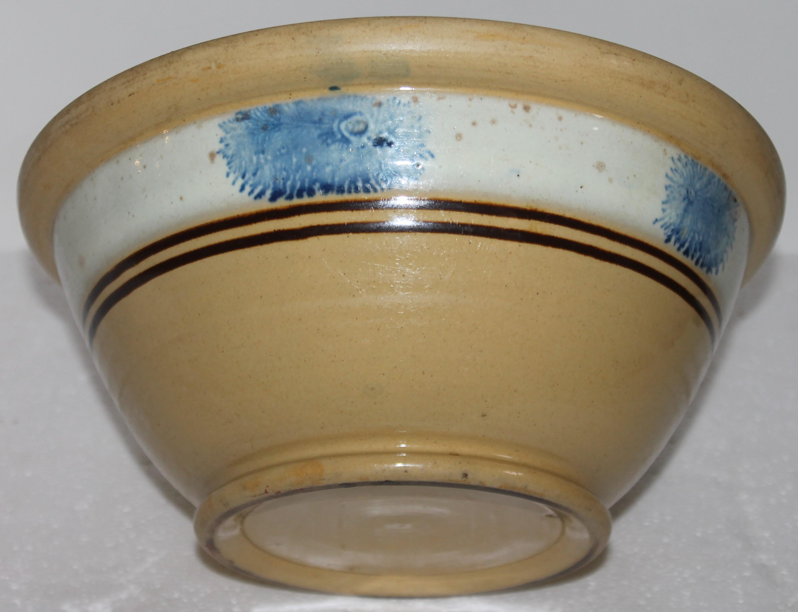 19Thc yellow ware mocha blue seaweed pattern mixing bowl in pristine condition.