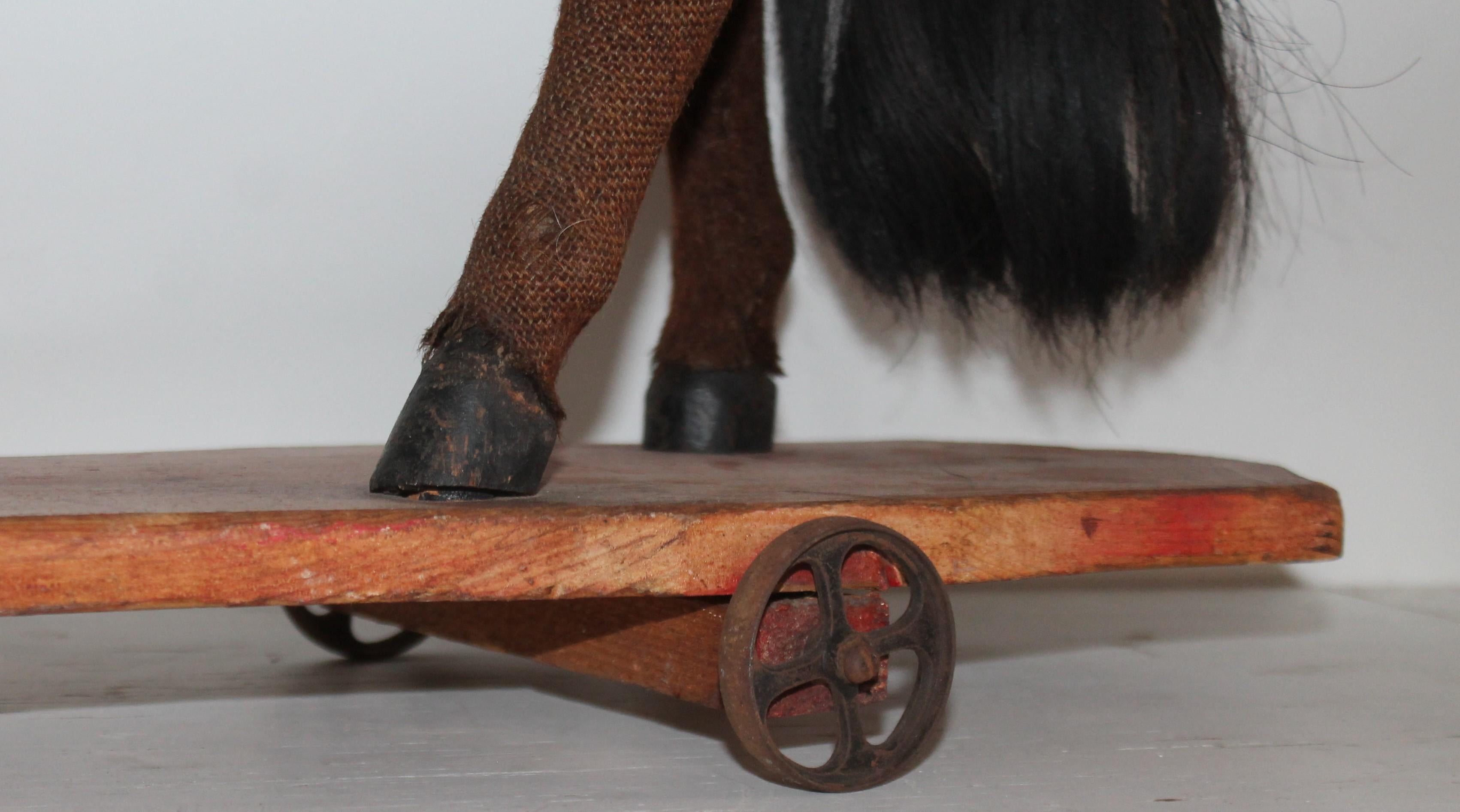 Wood 19th Century Mohair and Leather Horse on Wheels For Sale