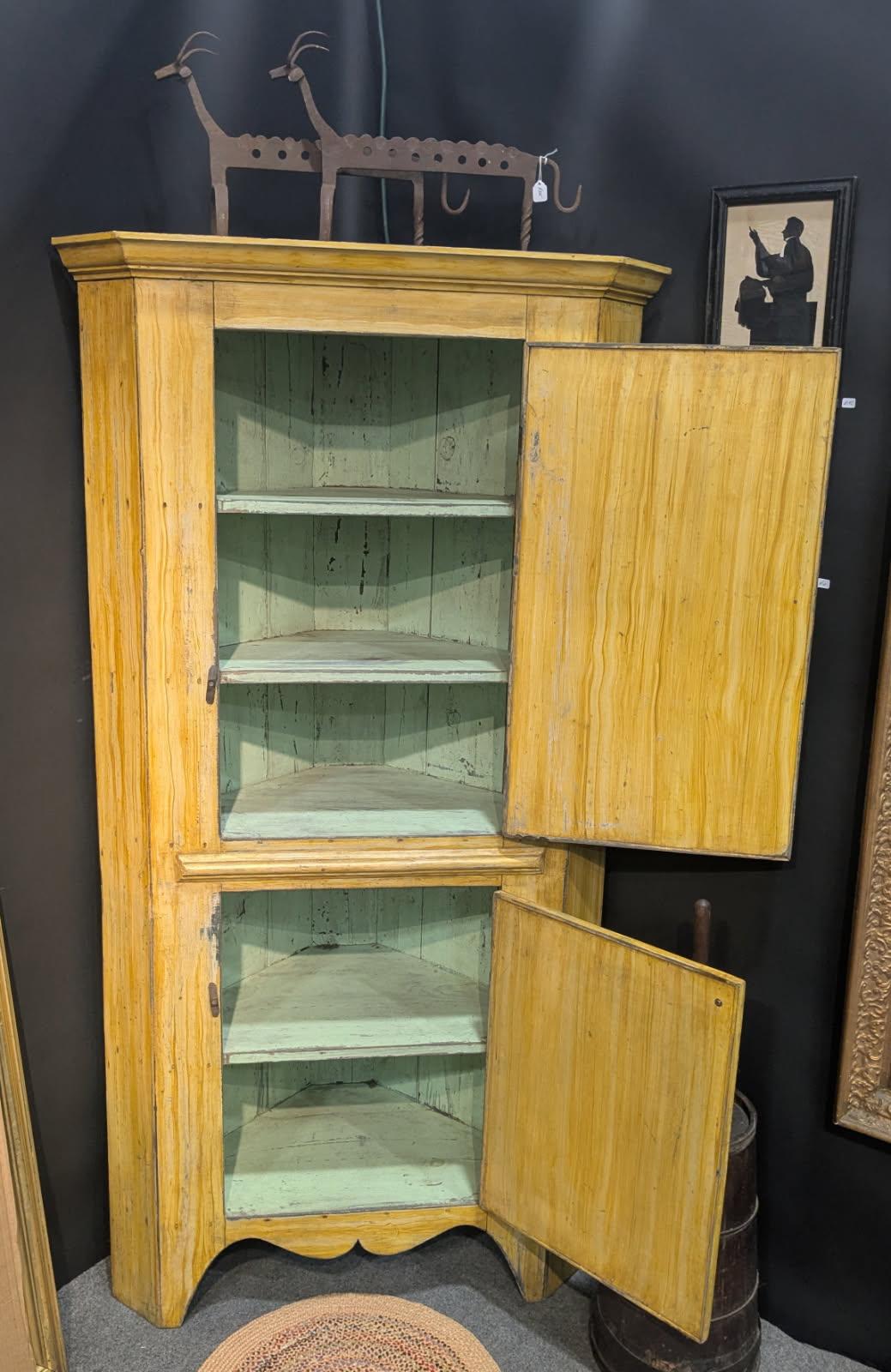 19thc Original painted mustard one Piece corner cupboard, Cover green painted interior. Probably Later paint on the interior. 
Circa 1860 - 1870.