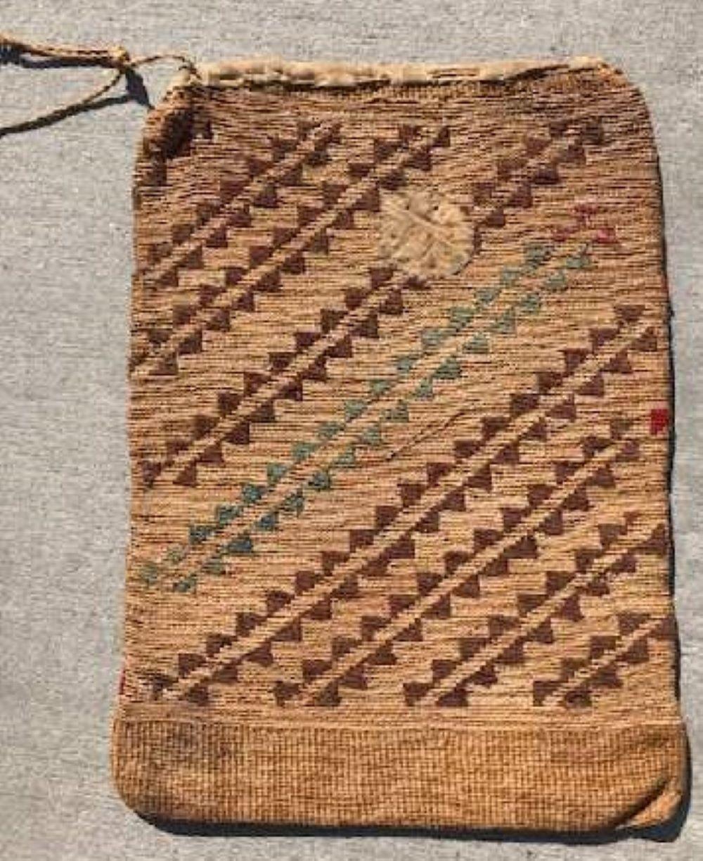 This very fine exceptional early 19th century native American Indian corn husk plateau bag. Fine condition with a fantastic patch repair on one side.