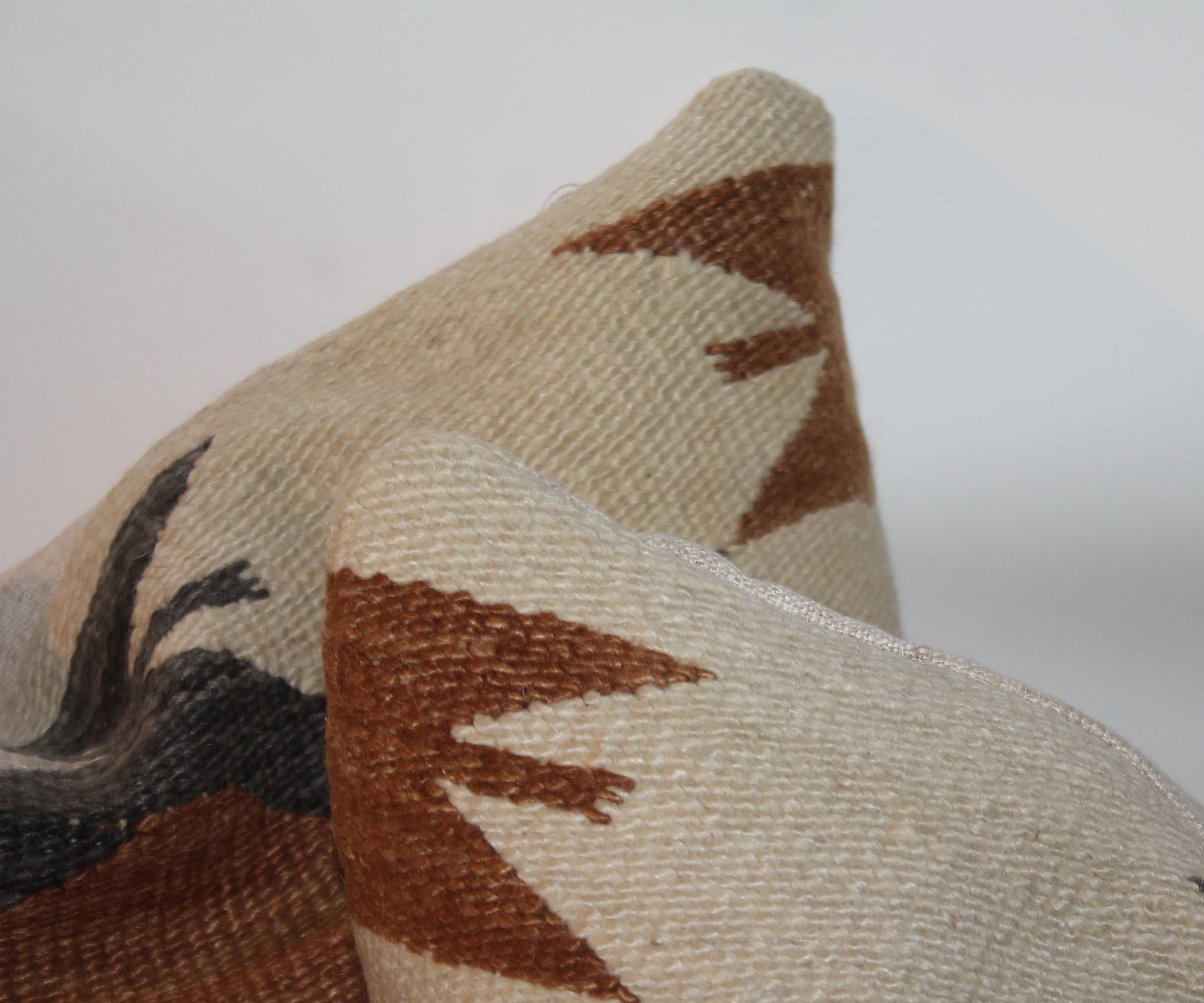 Fantastic brown & black Navajo Indian weaving pillows. Rare and unusual geometric design and colors.