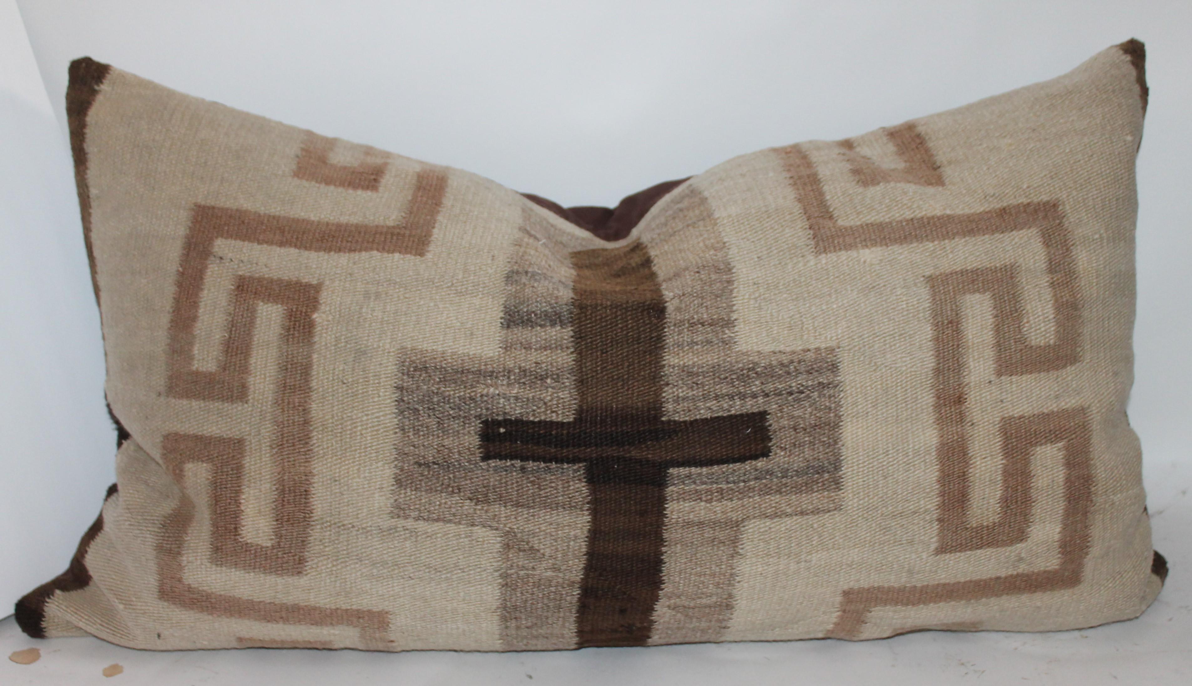 These two amazing and early Navajo Transitional Weaving pillows are in great condition with minor spotting or fade in areas. Sold as a group of two. One is a large cross and other is a geometric bolster. Both pillows were cut by the same