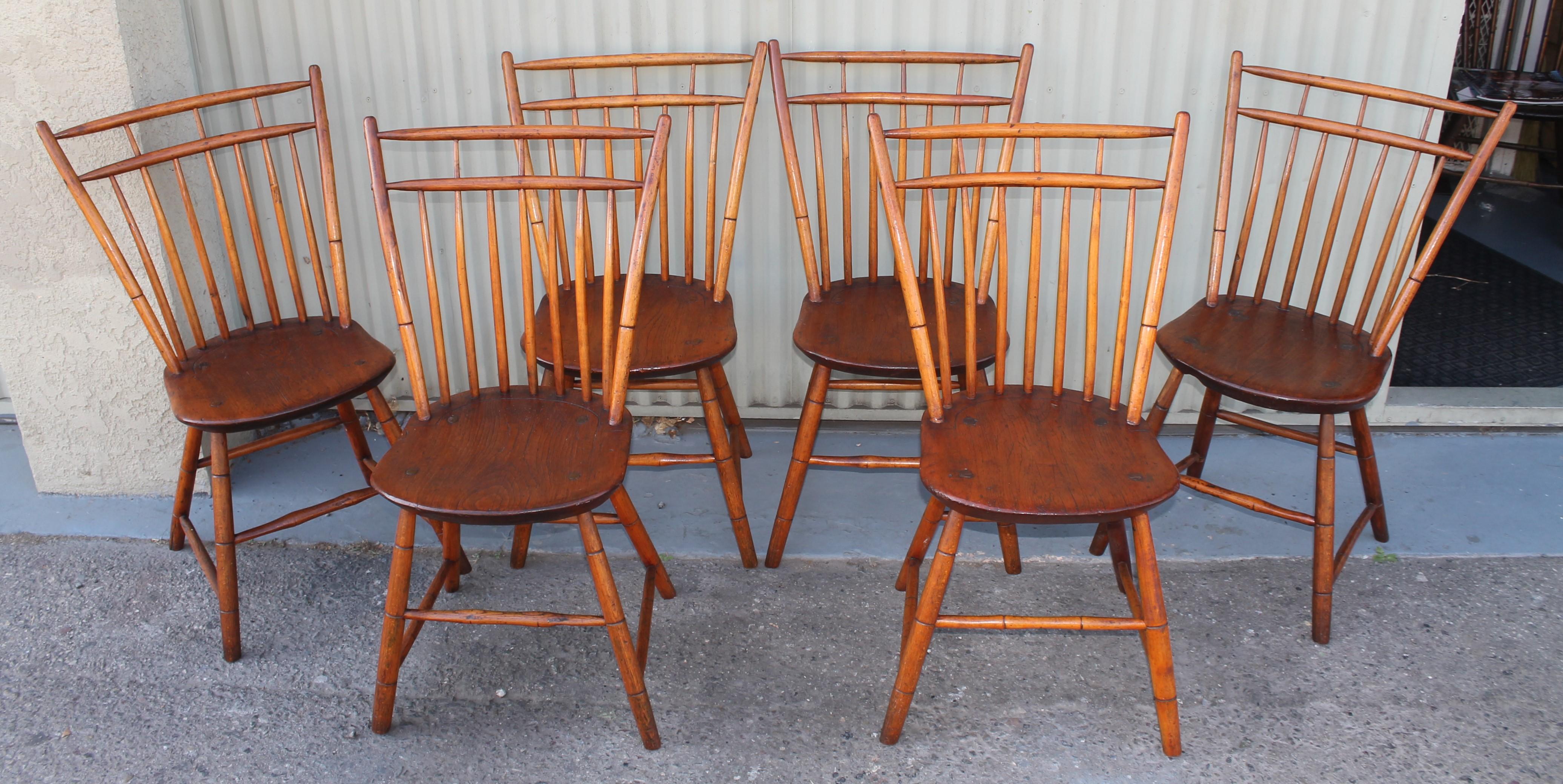 These Birdcage step down Windsor chairs were found in New England from a private collection and are in amazing condition. The woods are pine & hickory with a wonderful aged patina. The chairs are in very sturdy condition.