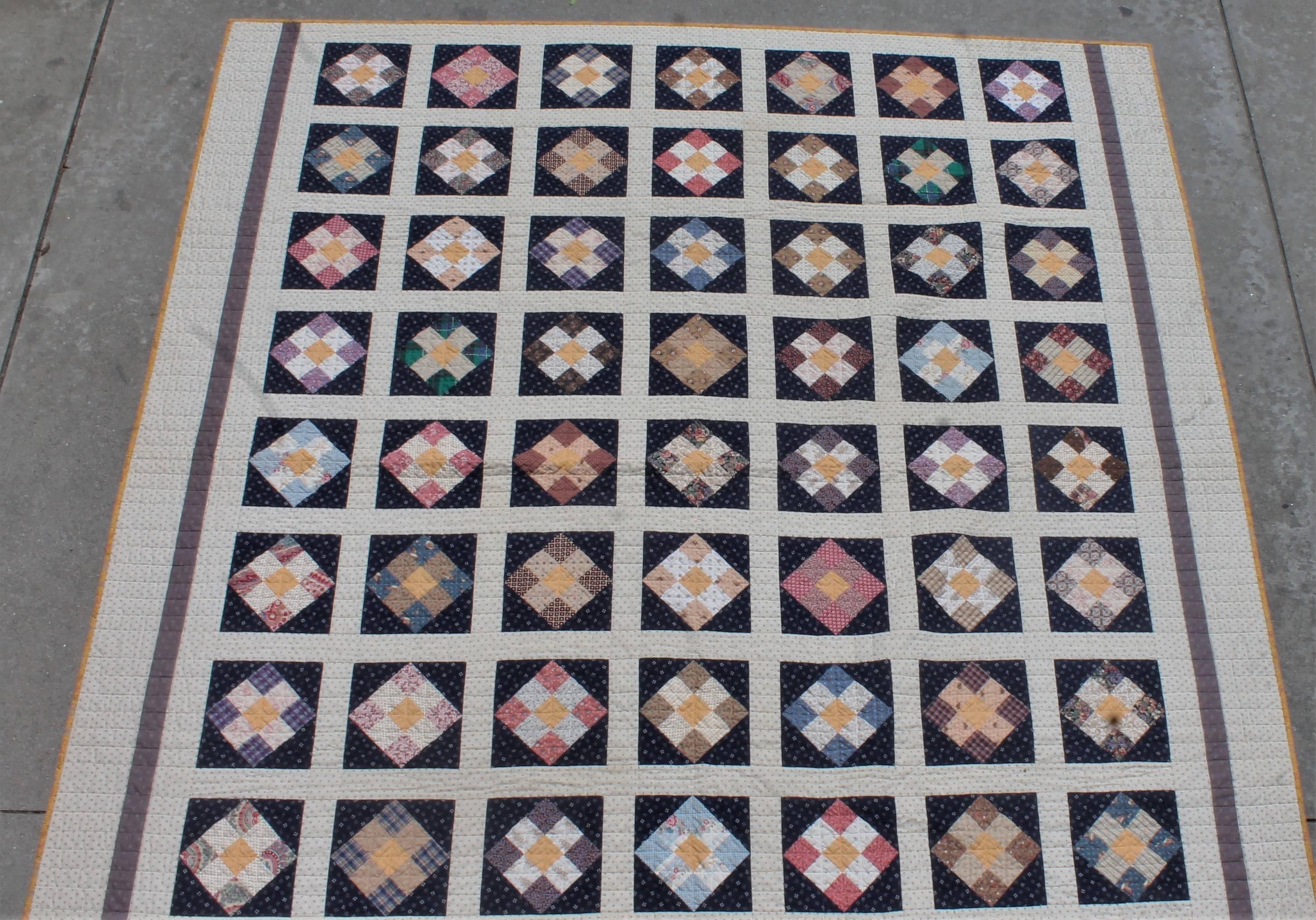 This fine early fabric example of a sampler nine patch quilt is in very good condition. It has hand pieced pieces and has treadle machine over throughout the quilt. This was done to keep the condition strong and great! These bars of nine patch's