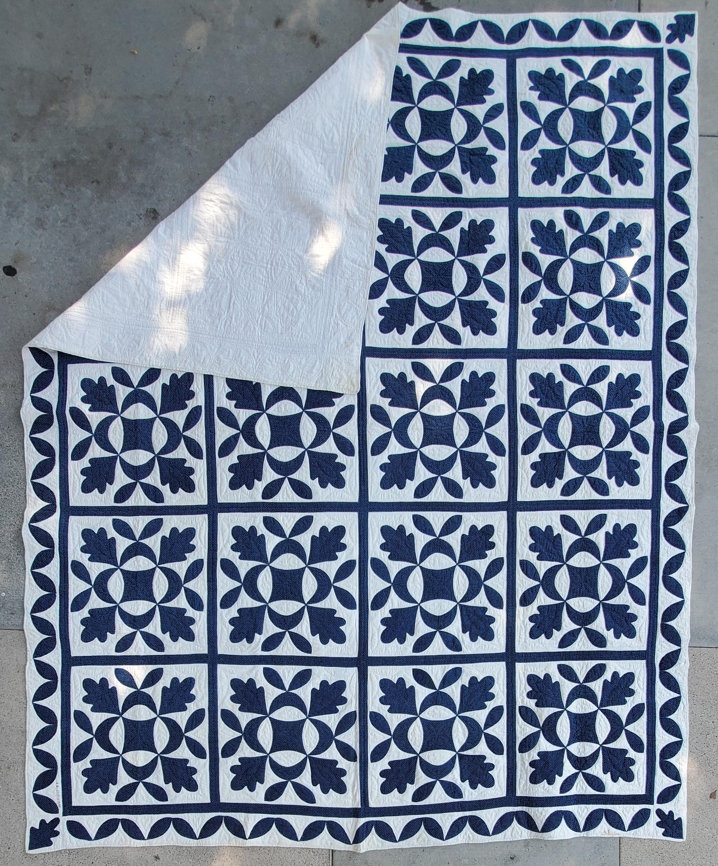 This amazing New England oak leaf applique quilt in blue & white is signed Jenny and dated 1848 in embroidery on lower right hand corner.This amazing applique quilt has very fine quilting with hearts and detailed quilting. It has a wonder vine