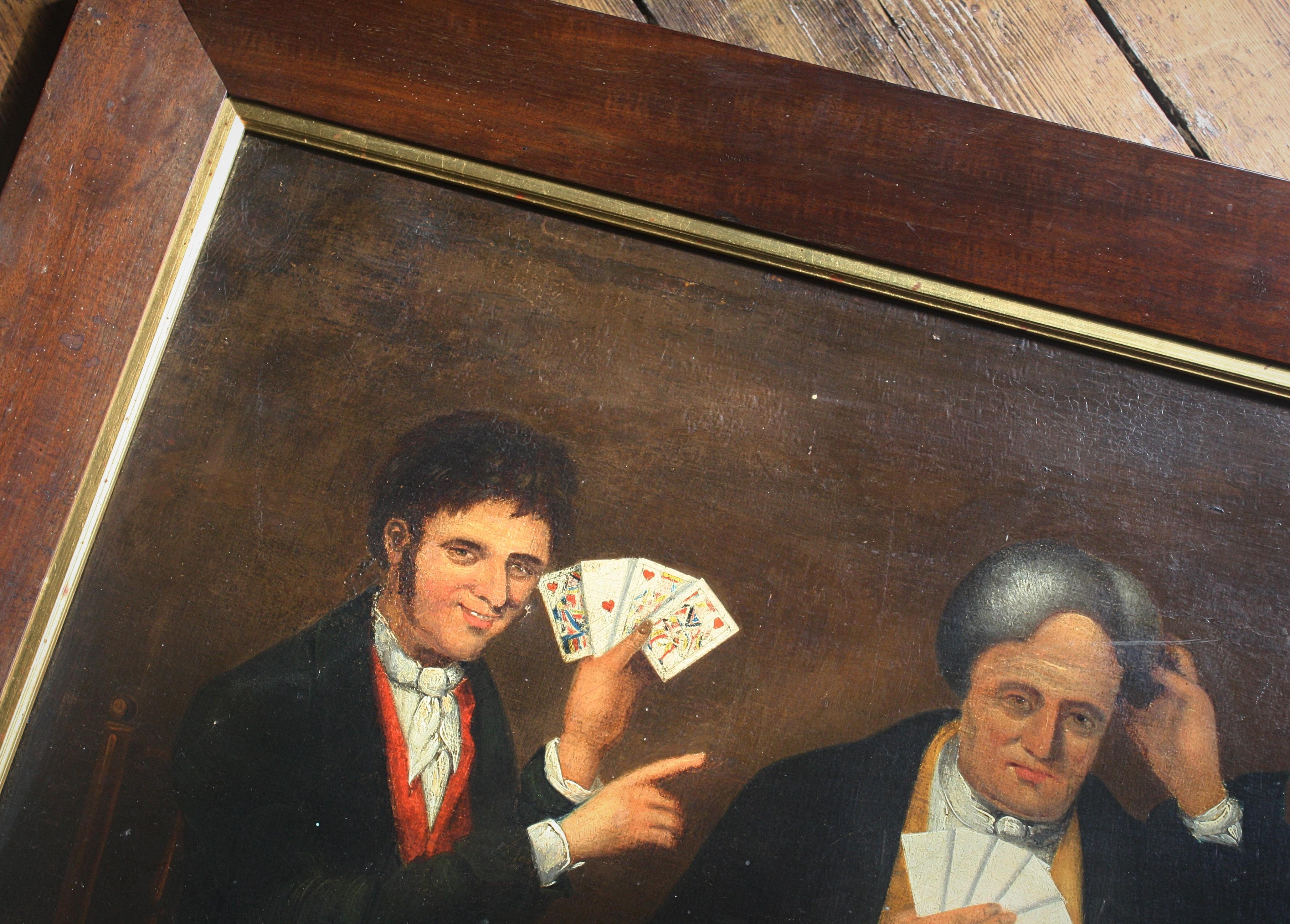 A large 19th century oil on canvas, of two gents playing cards.

English in origin, Provincial in style. 

The surface is in overall good condition, there is a section of small damage with paint loss near the face of the card player on the