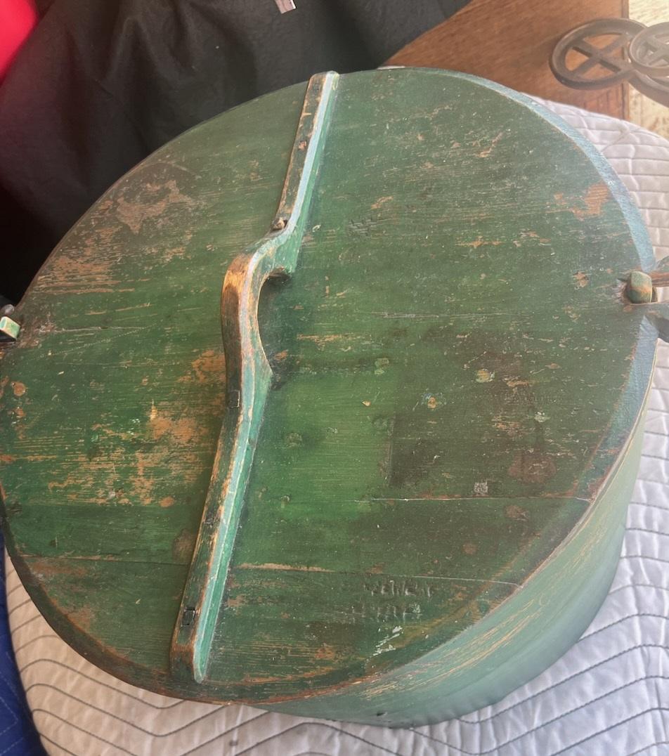 This amazing early 19thc over sized hat or over sized  pantry box in original apple green painted surface.The condition is very good with an amazing patina.