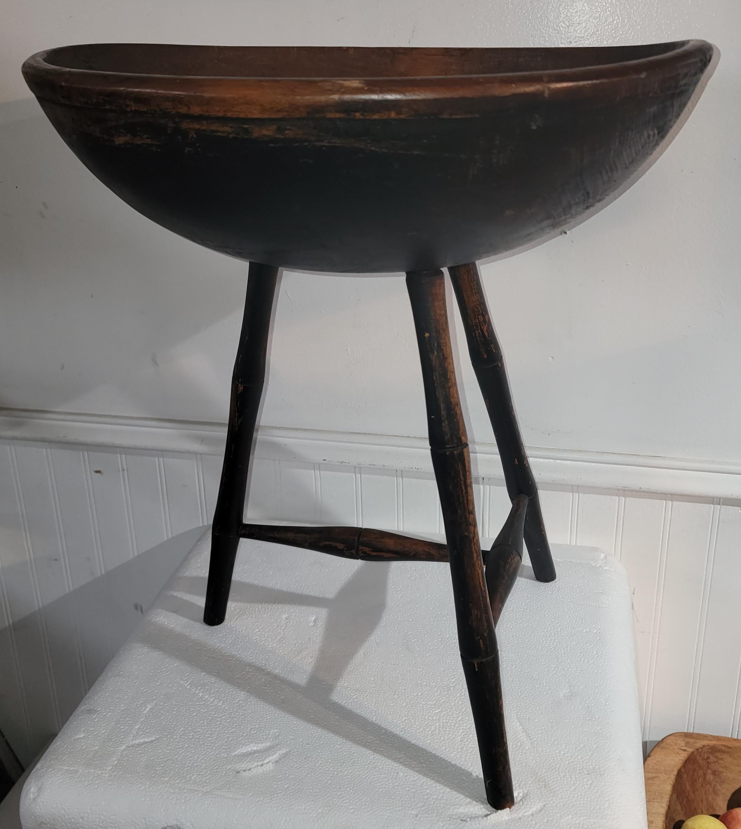 19th Century Original black painted butter bowl on legs. Fantastic surface with bamboo turnings in fine condition.