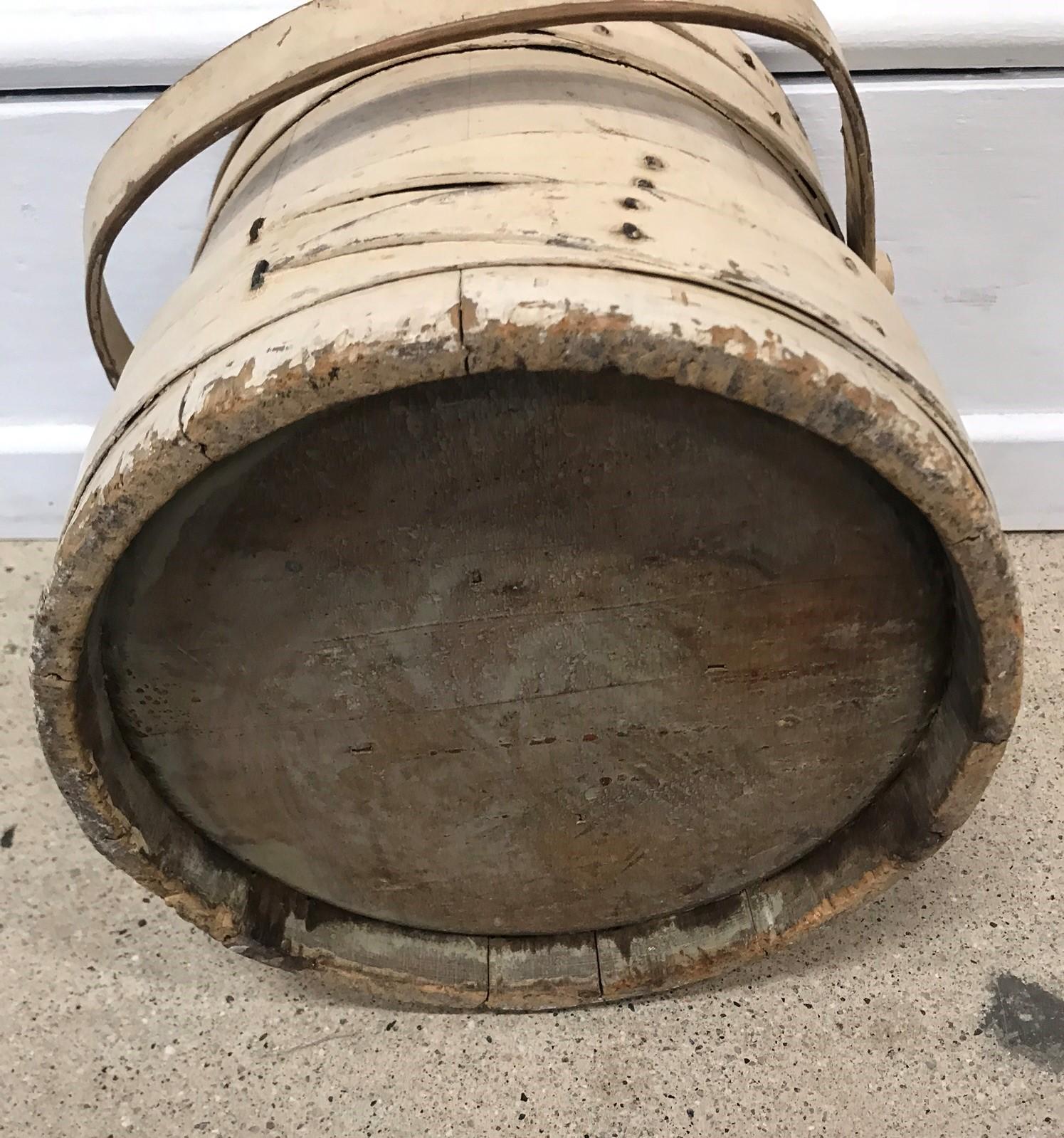 This 19th century original cream painted furkin / bucket. The condition is very good with a nice mellow patina.
