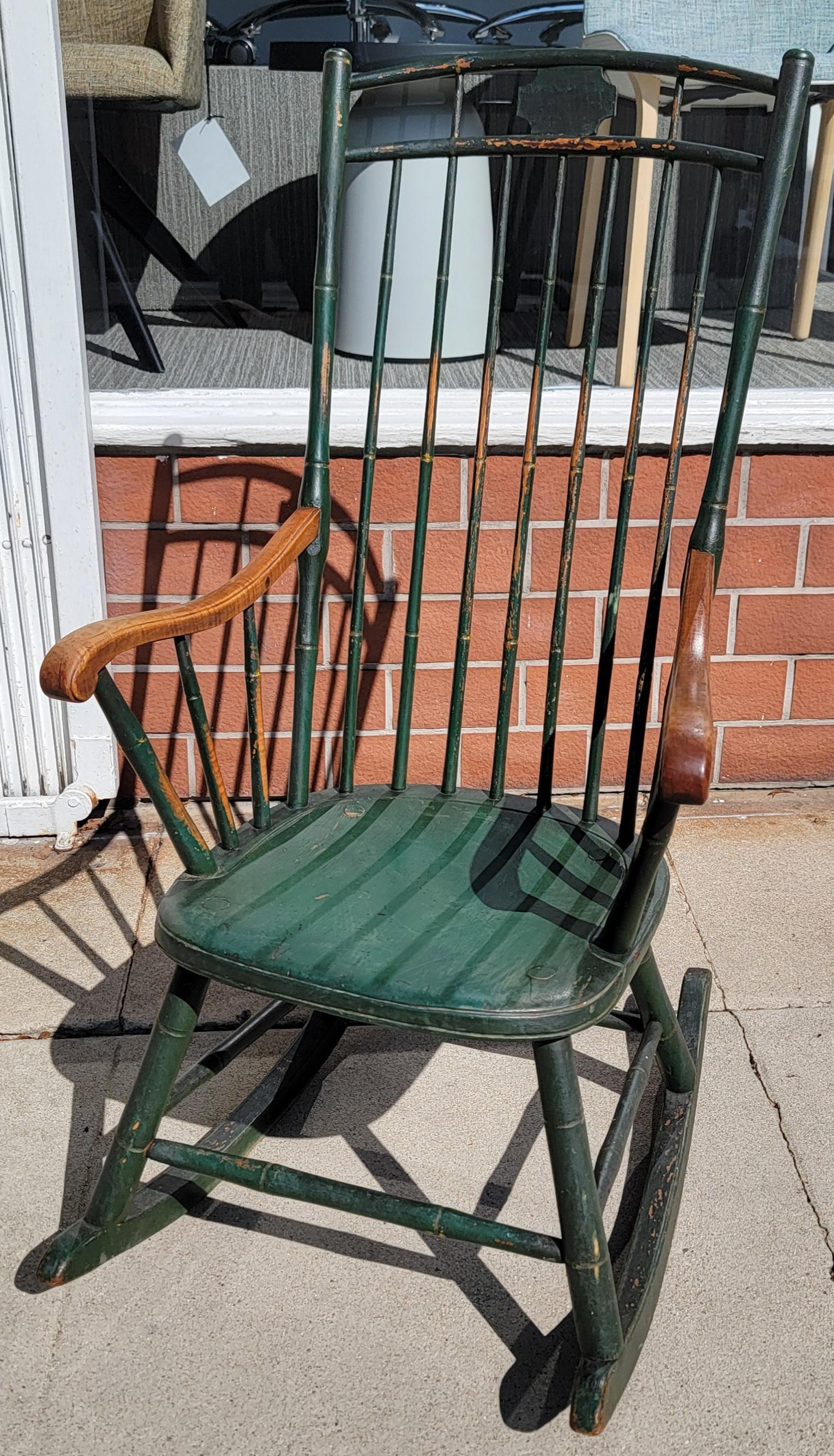 This fine and early  19Thc bird cage rocking chair has original undisturbed painted surface.The condition of this early Pennsylvania rocking chair is very comfortable & sturdy.