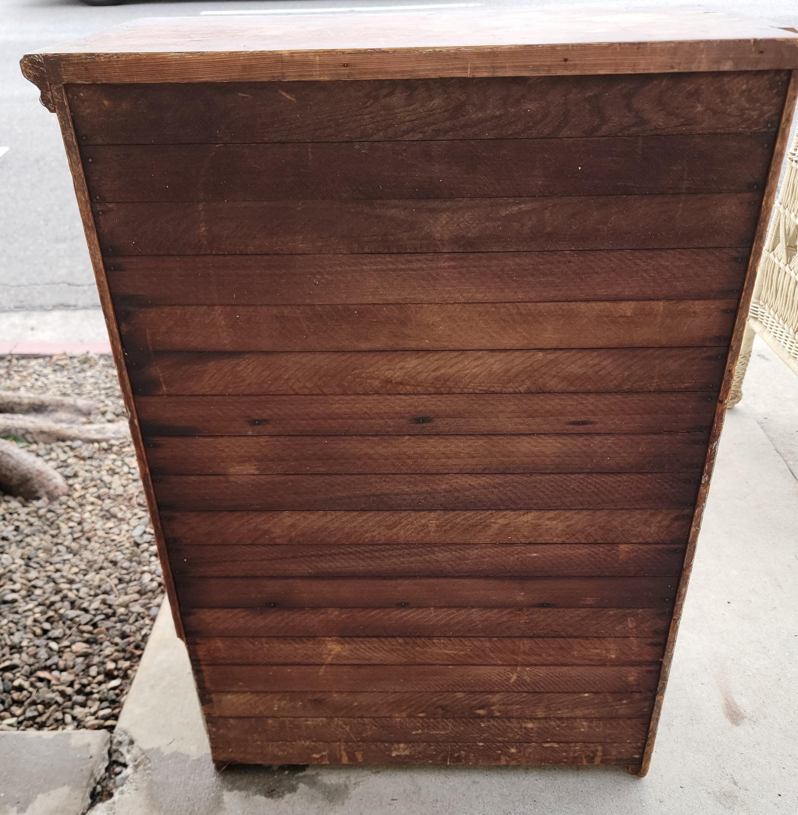 19th C Original grey painted floor or hanging cupboard in amazing undisturbed surface and square nail construction.The condition is very good and was found in New England.This small little sweet cupboard is all original hardware and door pull.