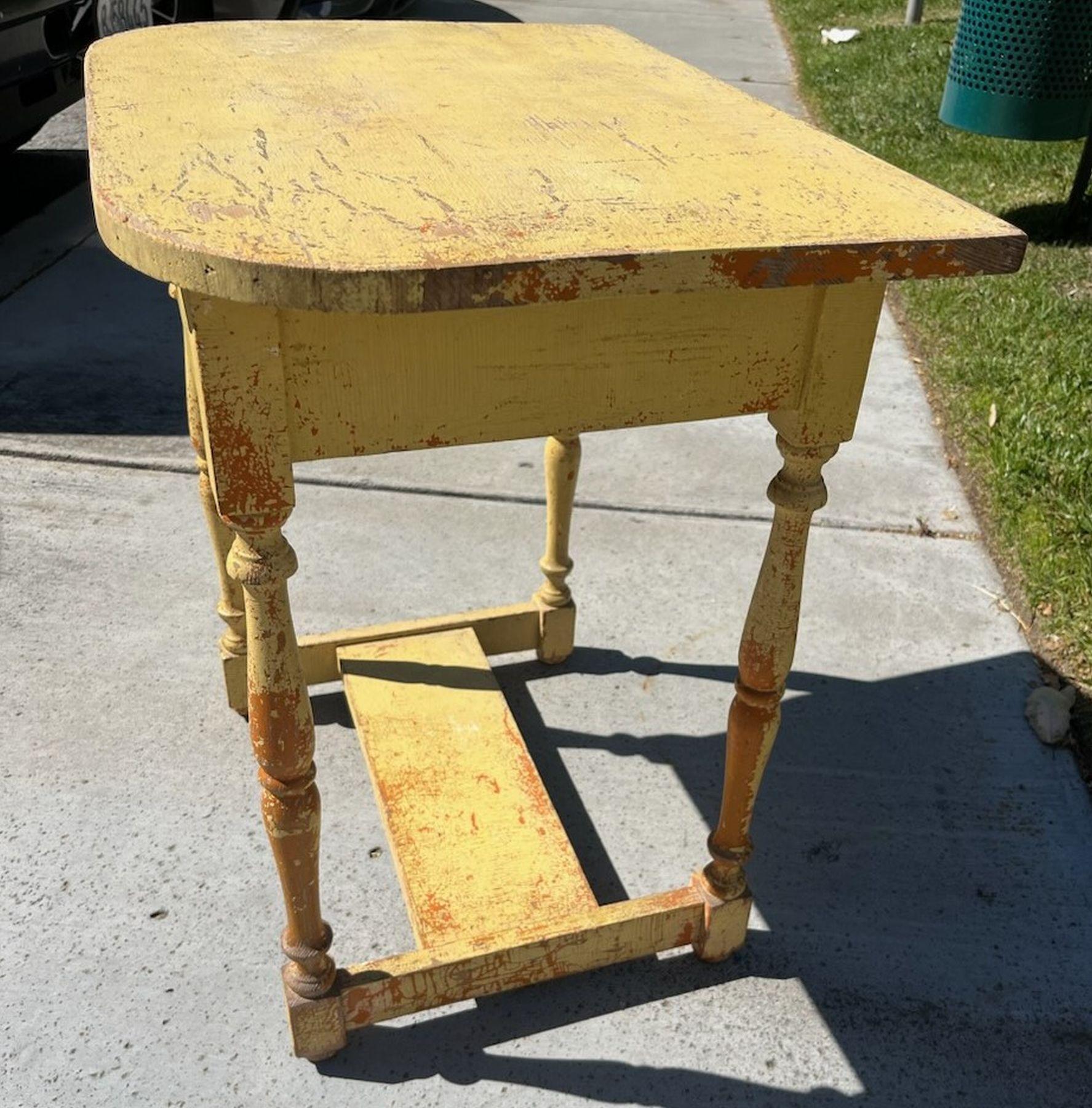 19thc mustard side table/end table from New England with single drawer.
alligator-ed mustard paint. Wonderful design.