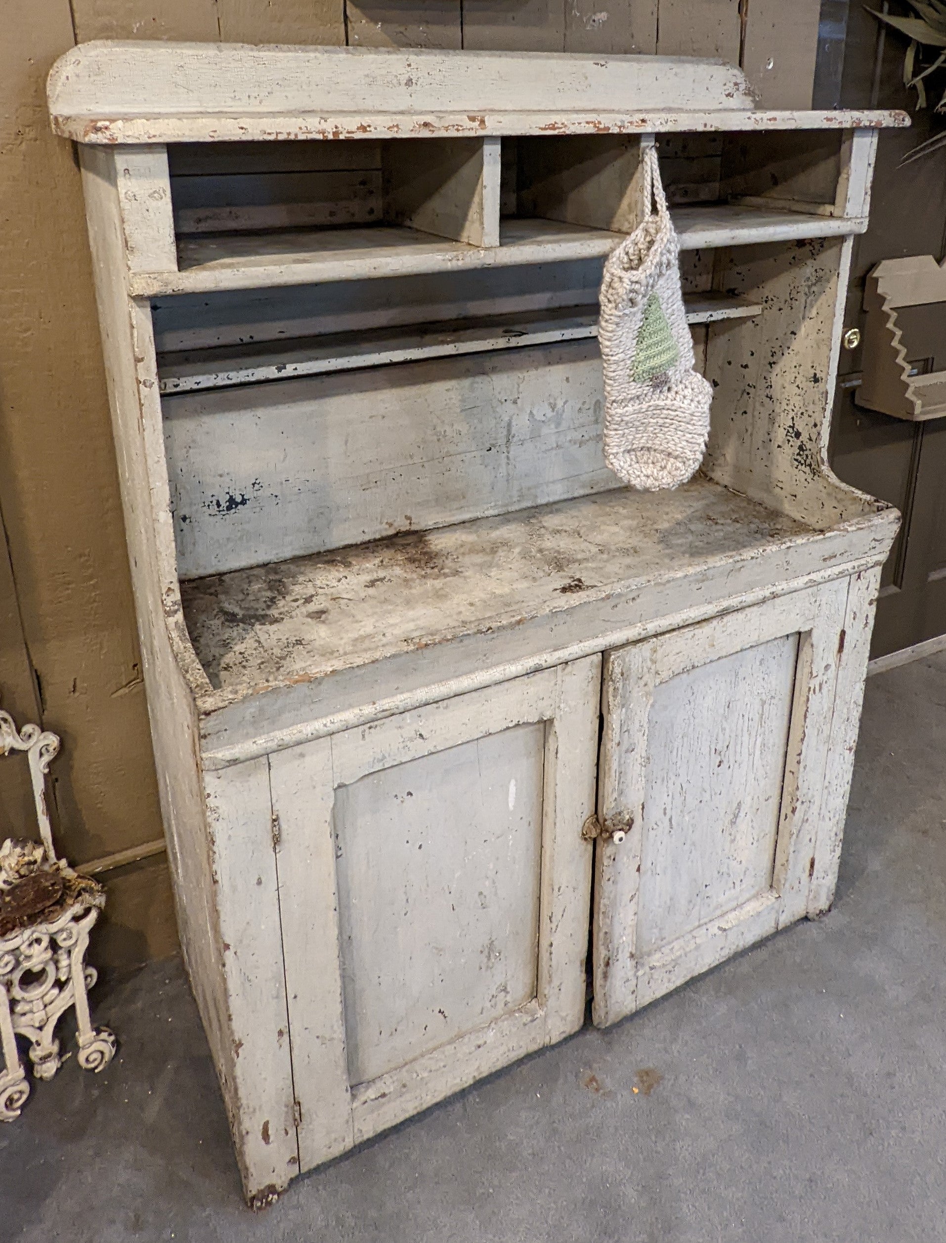 This fantastic original white painted dry sink was found in Ohio but we feel like it was made in Pennsylvania. The surface is all original with some minor paint loss but fantastic surface.