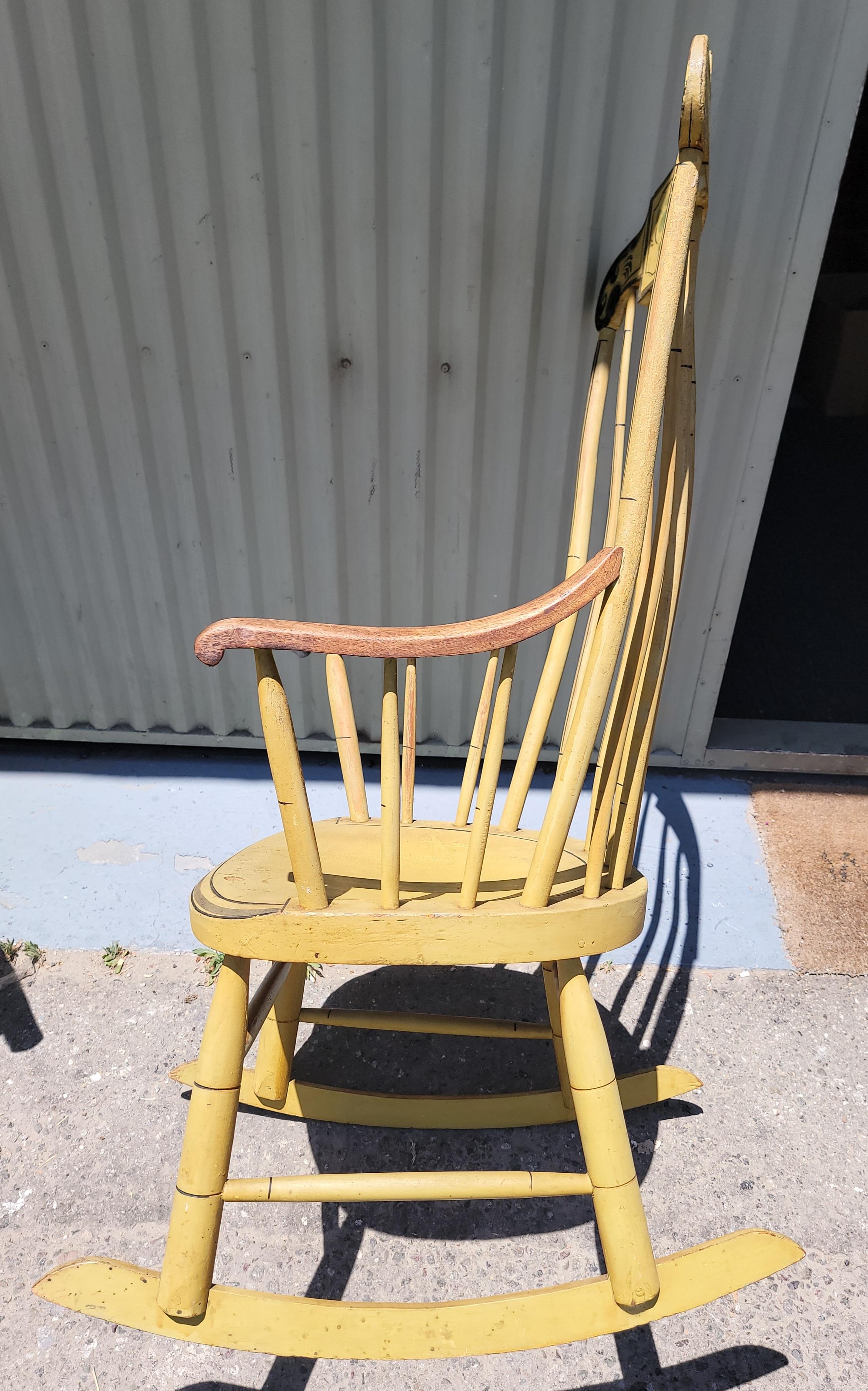 19Thc Original paint decorated New England rocking chair in pristine condition.This fine rocking chair has a mustard painted surface with black decorated splash.