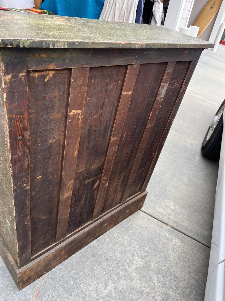 This grungy original painted sage green book or collectors shelf is in good sturdy condition. This shelf has a crackled or aligatored surface. Would be great filled with Folk Art or antique books.