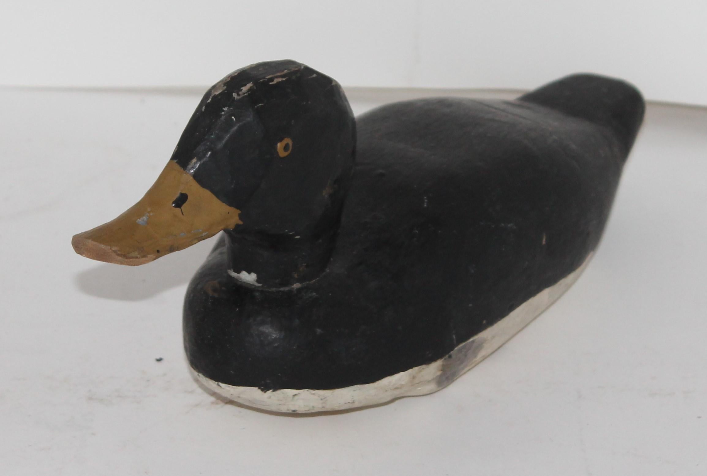 19th century original painted and hand carved matching pair of decoys. This pair of course are slightly different because of them being hand carved and painted.