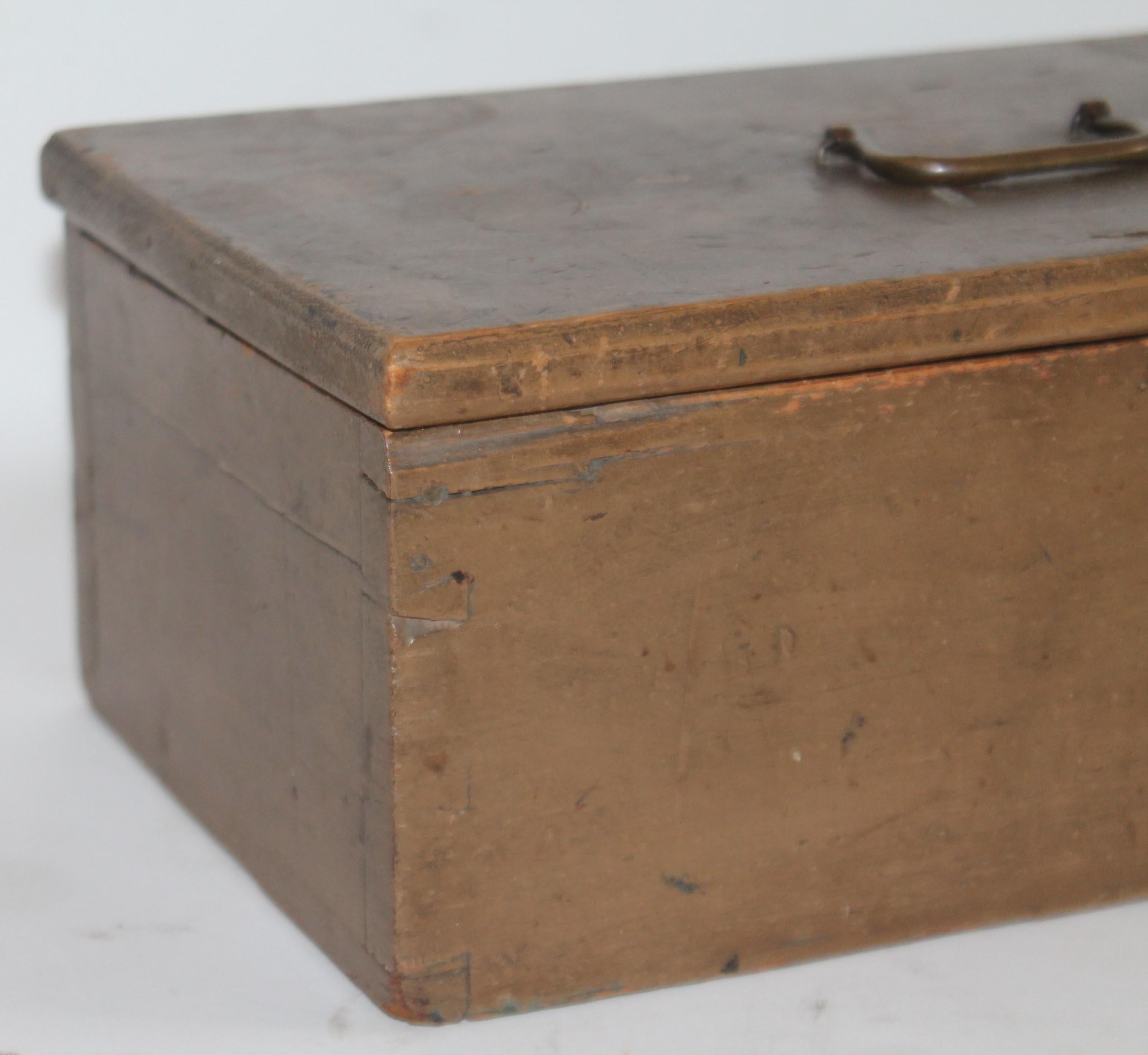 19th century original taupe painted dovetailed document box from New England. The original brass handled.