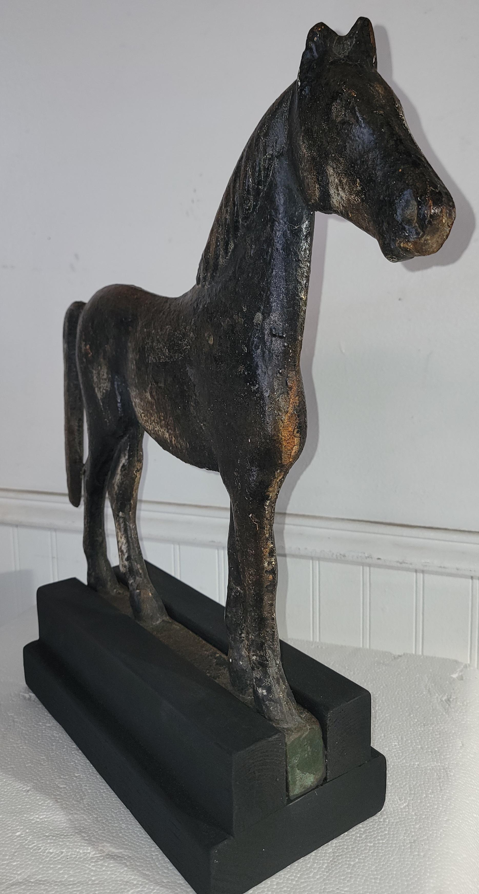 This amazing Fisk made original painted heavy iron windmill weight is in fine condition.It has been placed on a wood base mount,custom made of course.The surface of the paint is the very best !
Great addition to any folk art collection.