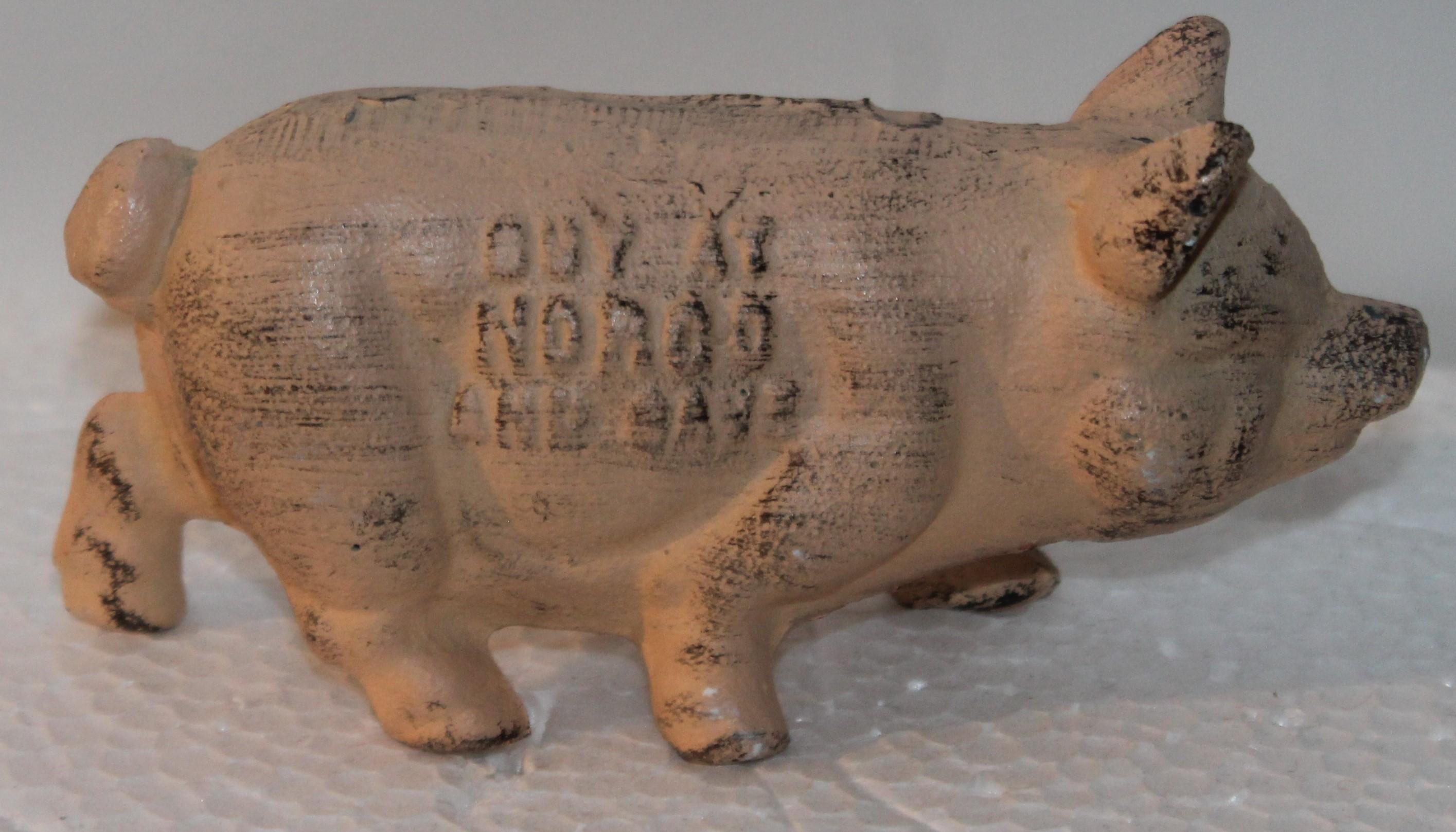 19Th century painted pink cast iron pig from Norco Foundry in Pottstown, Pennsylvania. It states: BUY AT NORCO FOUNDRY AT POTTSTOWN, PENNSYLVANIA. This is a very heavy paper weight or display ad.