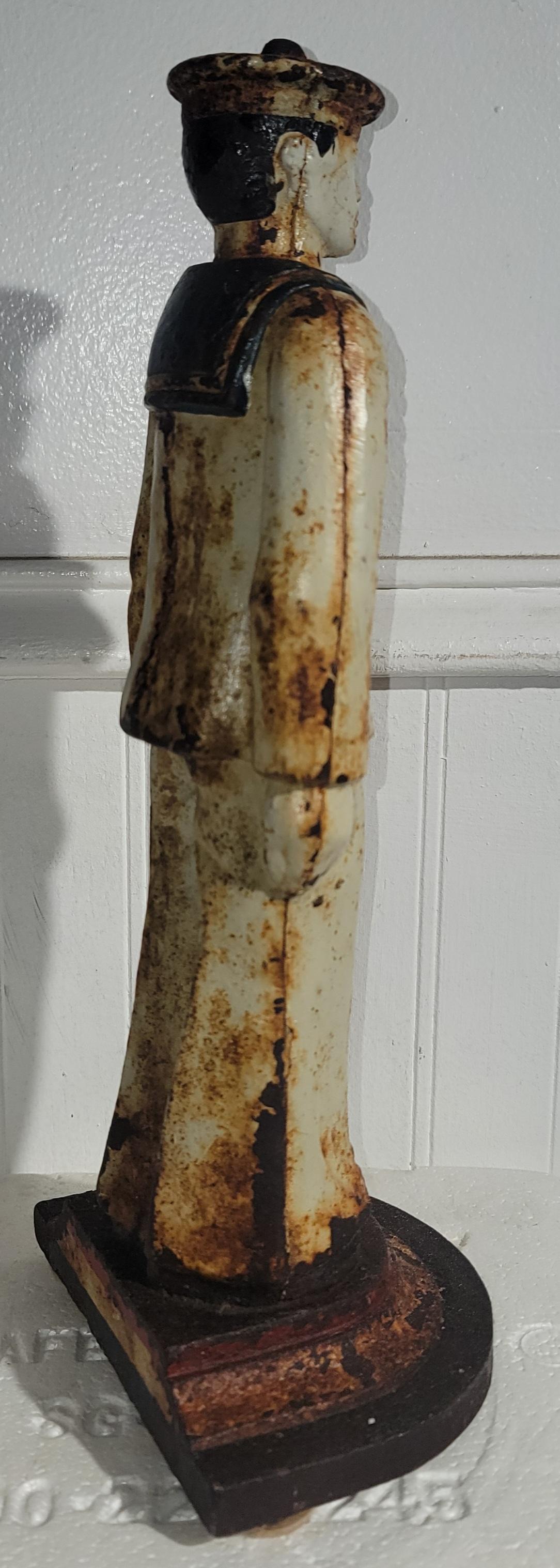19Thc Original painted  sailor door stop with great surface , minor rust to the surface.This doorstop is very heavy and in great condition.
