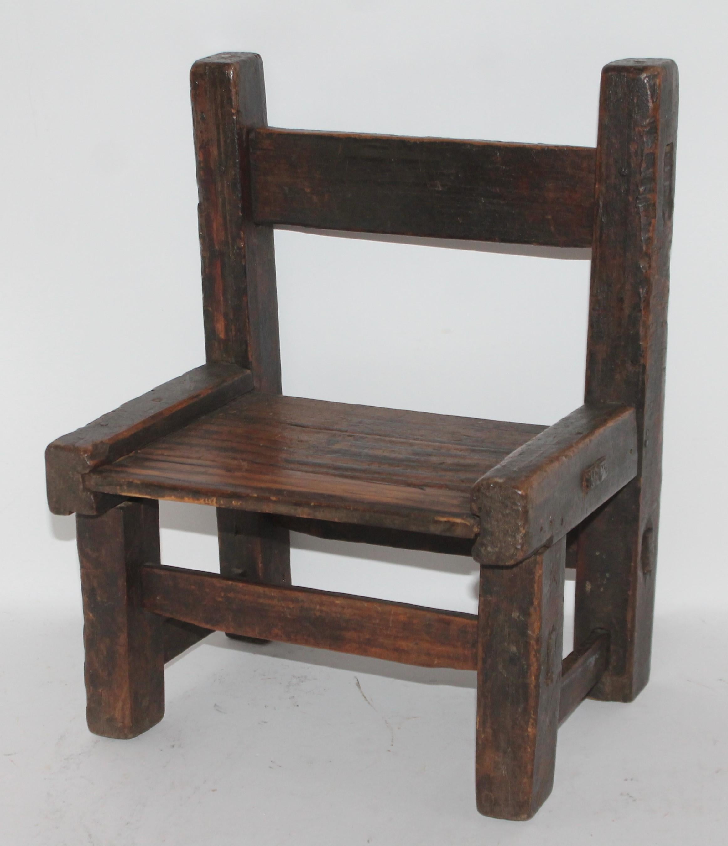 19th century original old surface child's chair from the Pueblo in New Mexico. The construction is mortised on all sides.