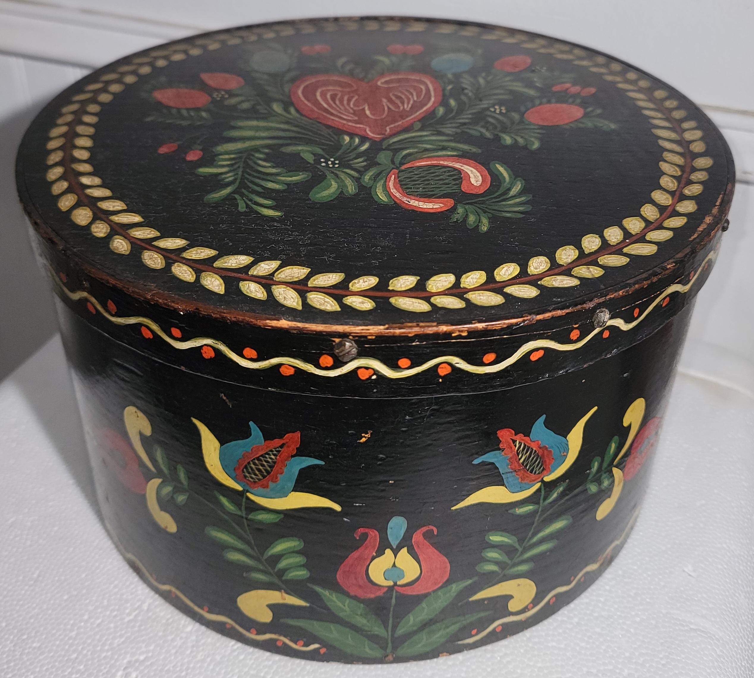 This 19Thc early pantry box was used in the kitchen for feeds and grains. This was paint decorated later in the early 20thc.Looks like a Peter Hunt painted or decorated style. The condition is very good.