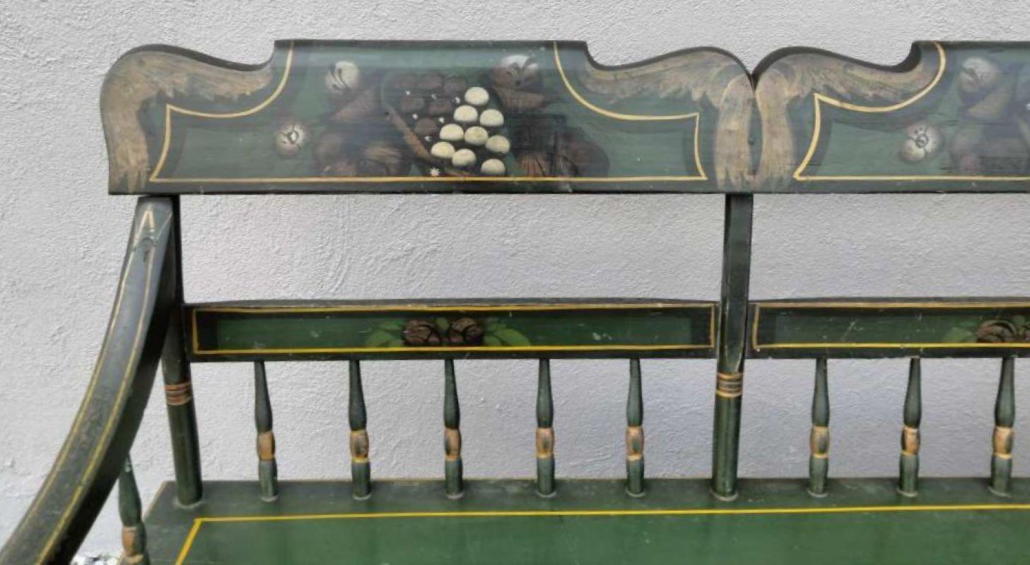 19th Century original paint decorated settle bench from Pennsylvania. This amazing settle was found in Bucks County, Pennsylvania and came from a Philadelphia estate. The surface is just wonderful and pristine stenciled paint. The seat is a large