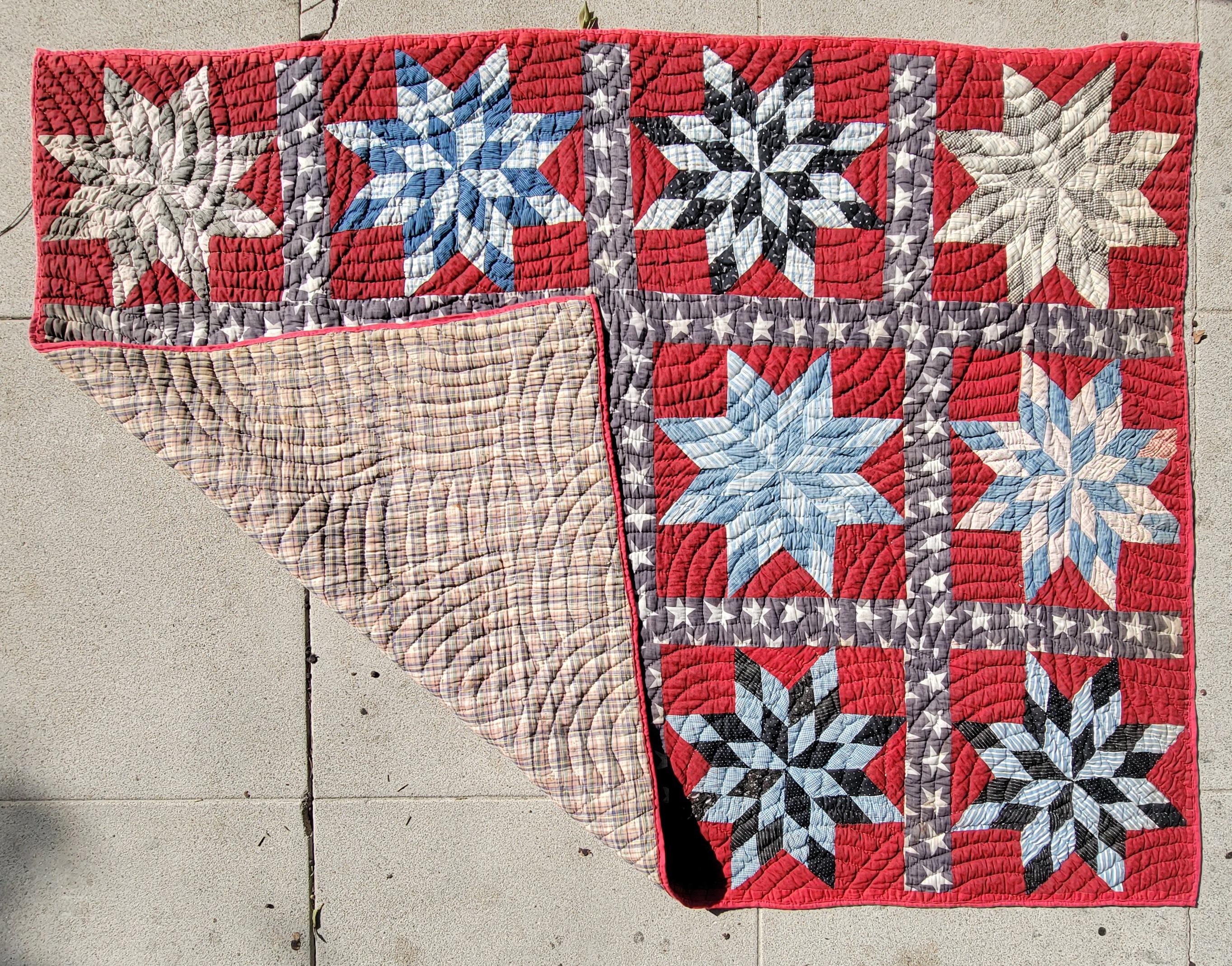 19thc contained stars Flag bunting cotton sashing. The backing is in a brown homespun linen. Quilt from Alabama Circa 1870. Possibly Afro-American.