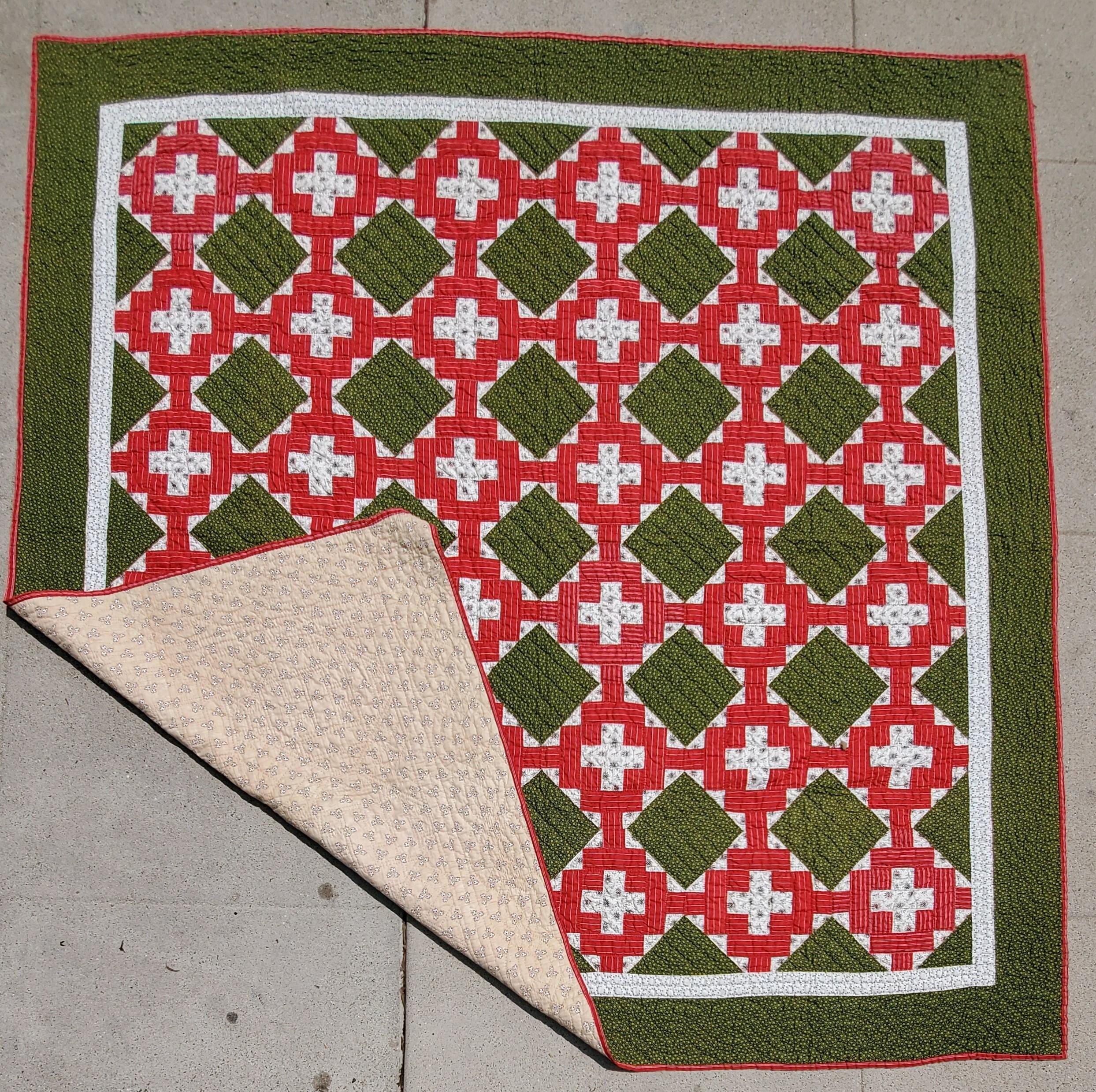 19thc Pennsylvania chimney sweep pattern quilt in red & green colors. This quilt was found in Berks County,Pennsylvania.The condition is very good.