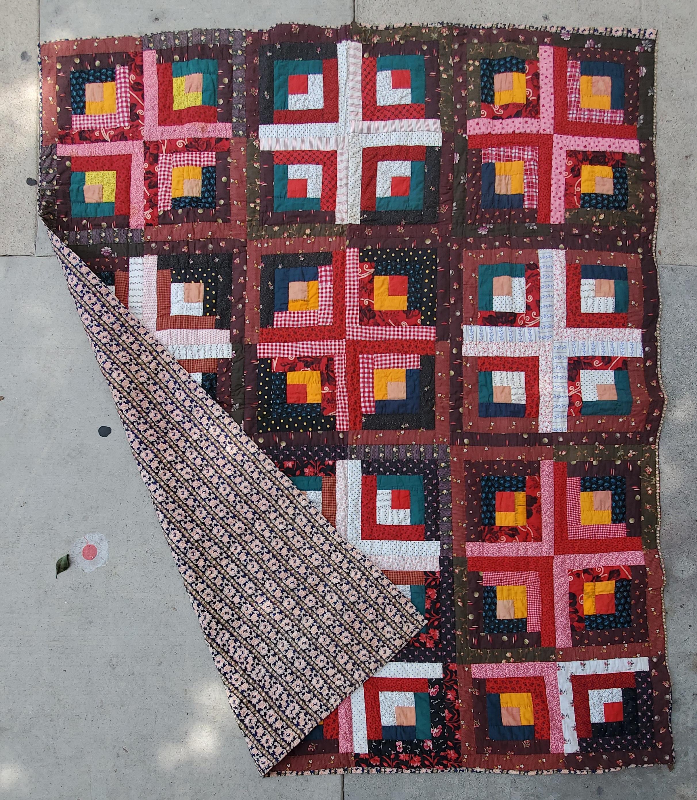19thc fancy calico fabric log cabin quilt. This barn raising quilt is in fine condition.