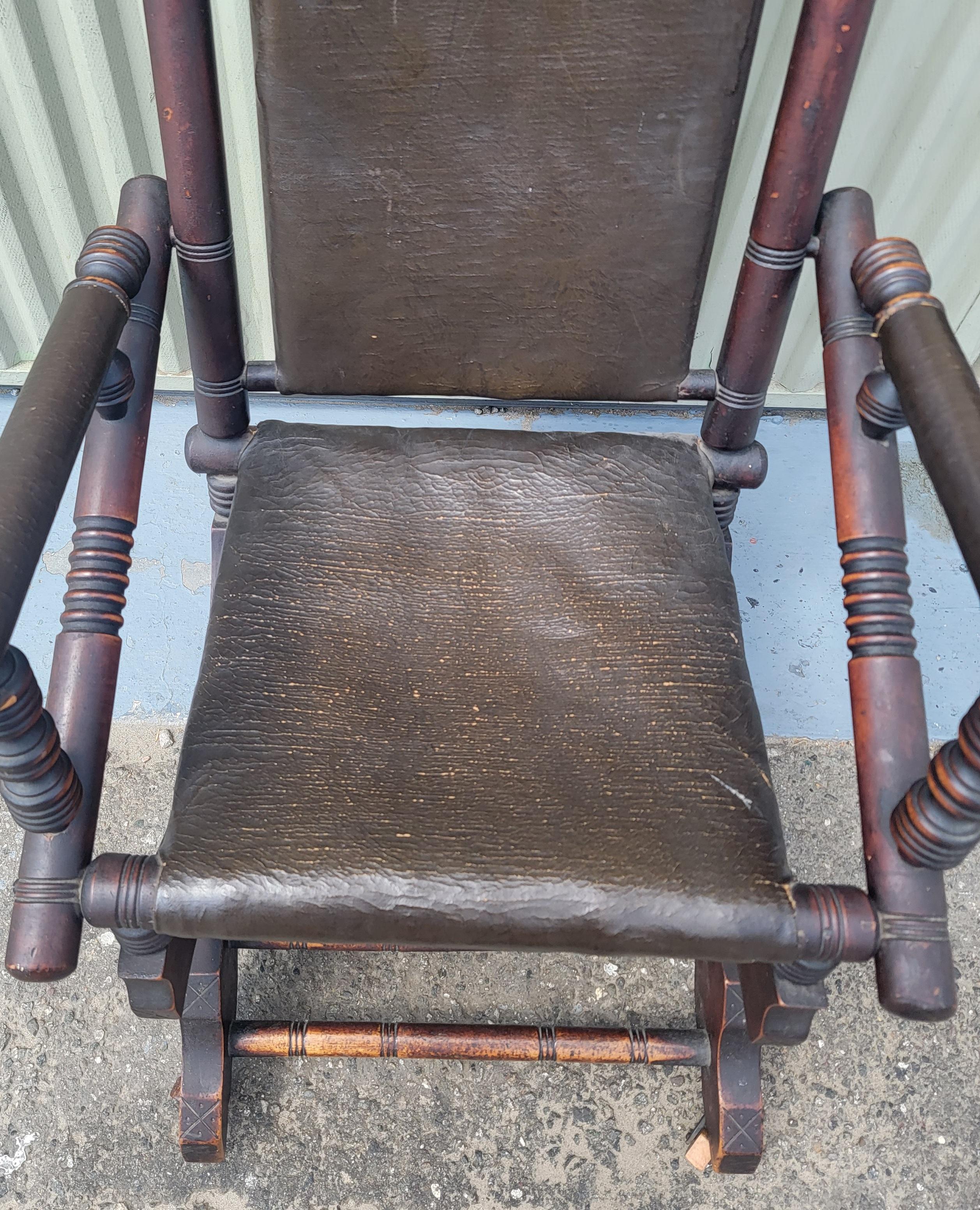 Patinated 19Thc Platform Rocking Chair in Leather / Oil Cloth For Sale