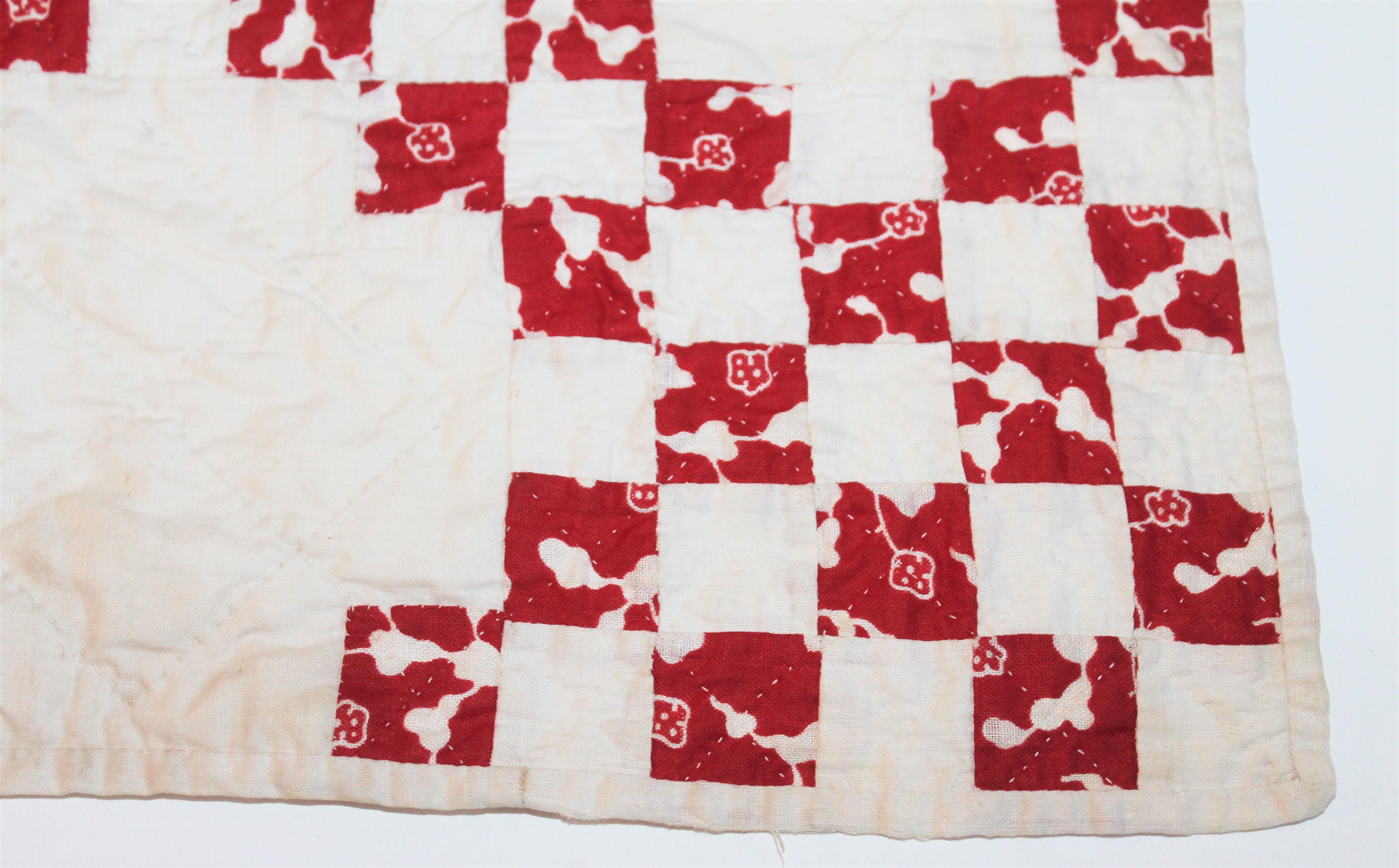 This fine early hand pieced and quilted tiny postage stamp crib quilt is for a new born baby. It is a real collectors dream as condition is mint! It was found in Berks County, Pennsylvania. It’s made in the late 19th century.