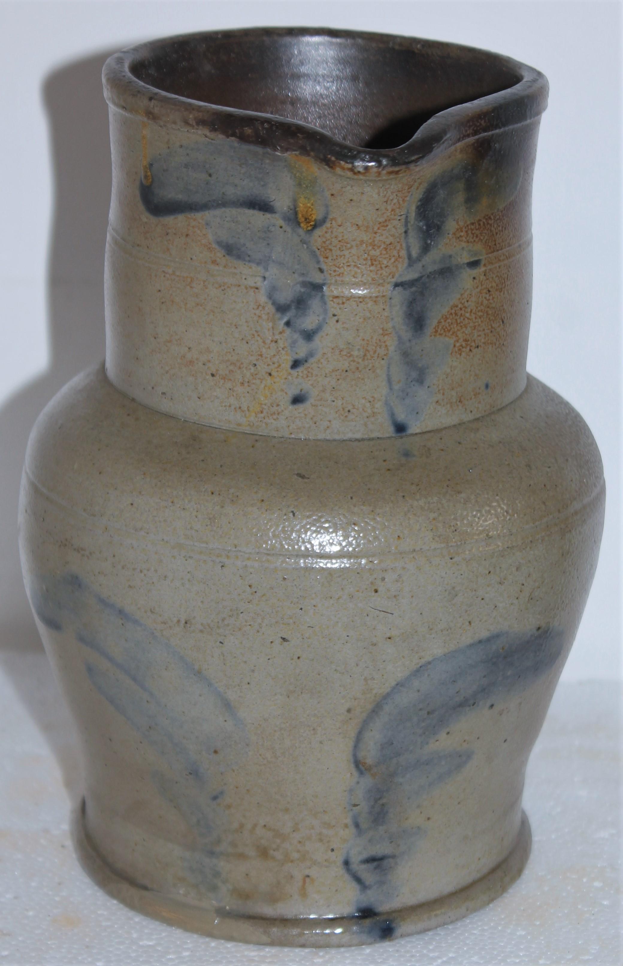 19thc decorated small scale decorated pottery pitcher. This is in fine condition and super rare scale.